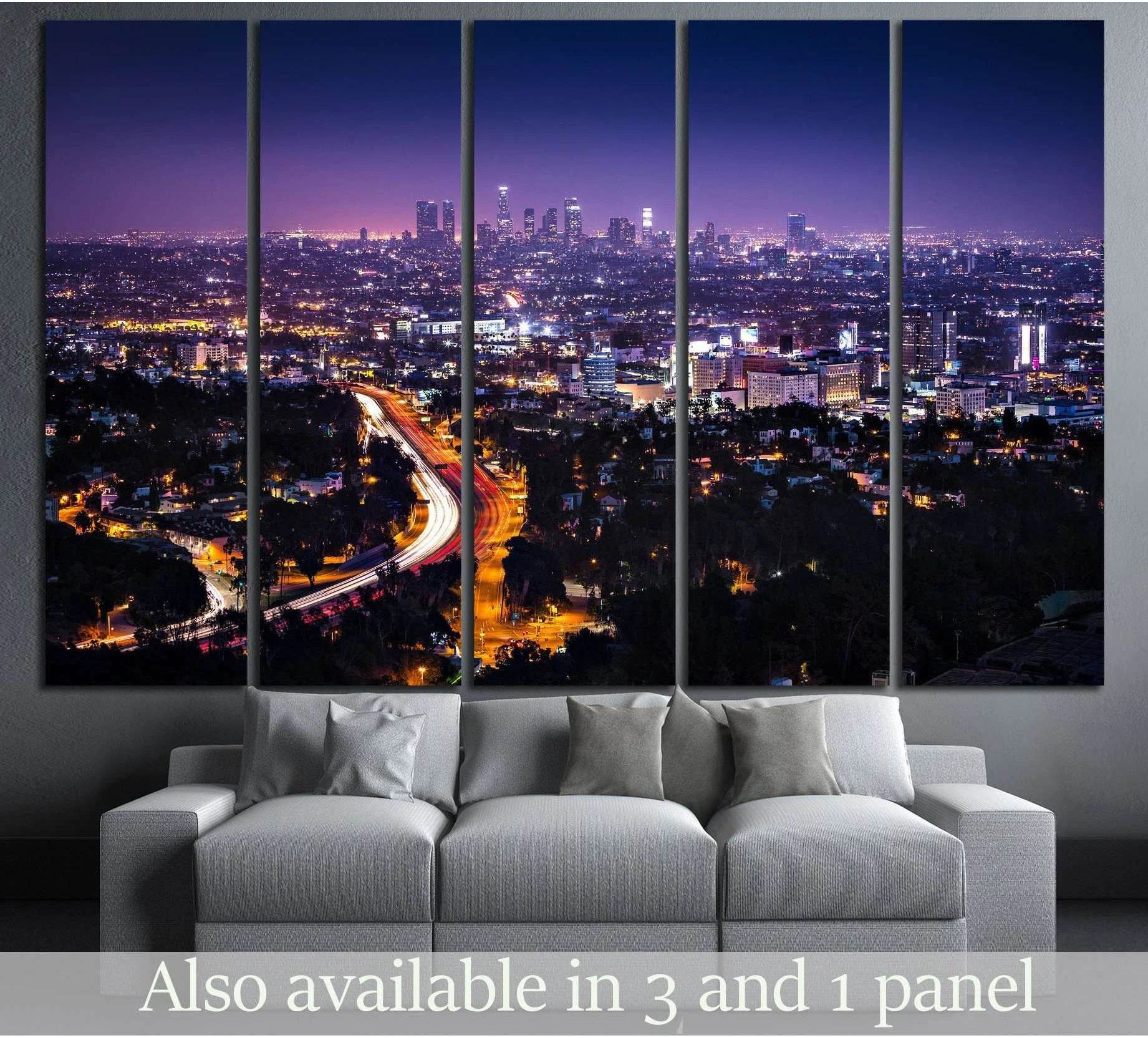 Downtown Los Angeles skyline canvas print in purple-blue night tones above a sofa