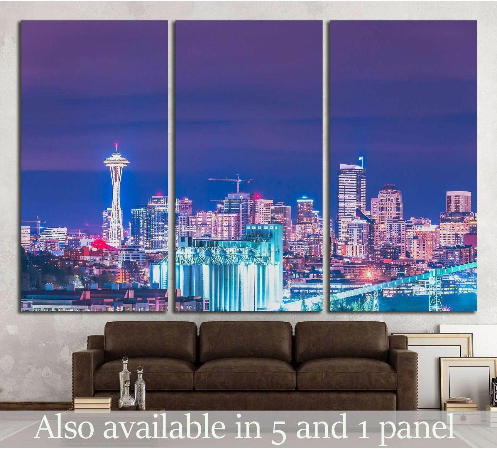 Seattle skyline canvas print with Space Needle at night above a sofa in a modern living room