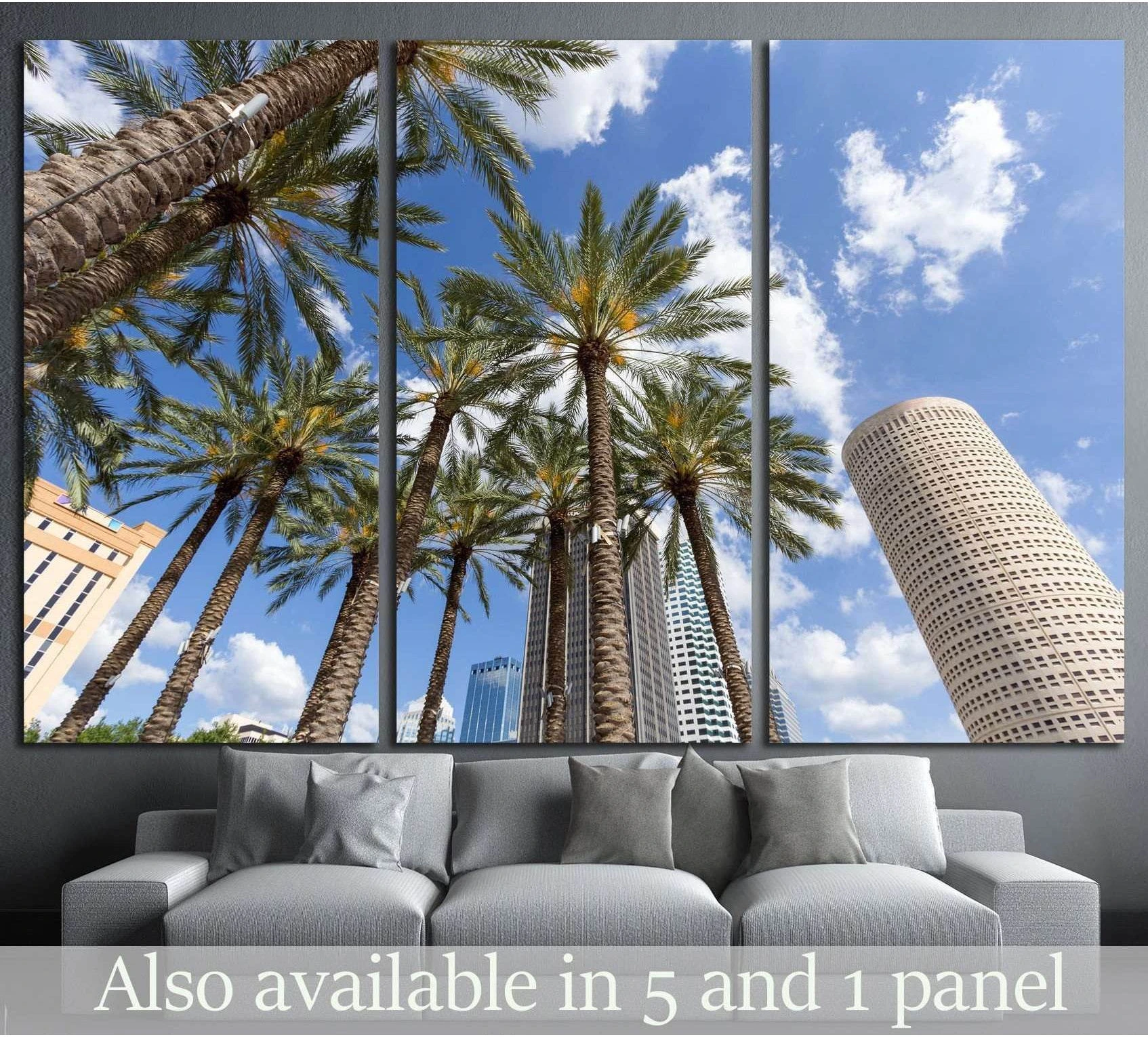 Downtown Tampa skyline canvas print with tall palm trees, blue sky, and city towers above a sofa
