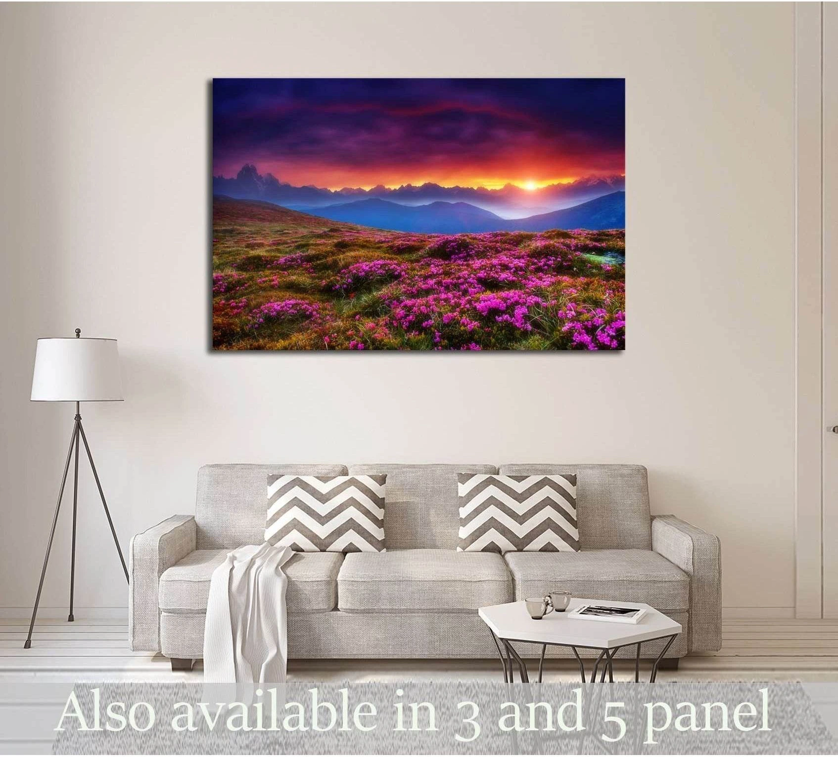 Georgia mountain sunset canvas print above sofa with pink wildflower meadow and layered blue peaks