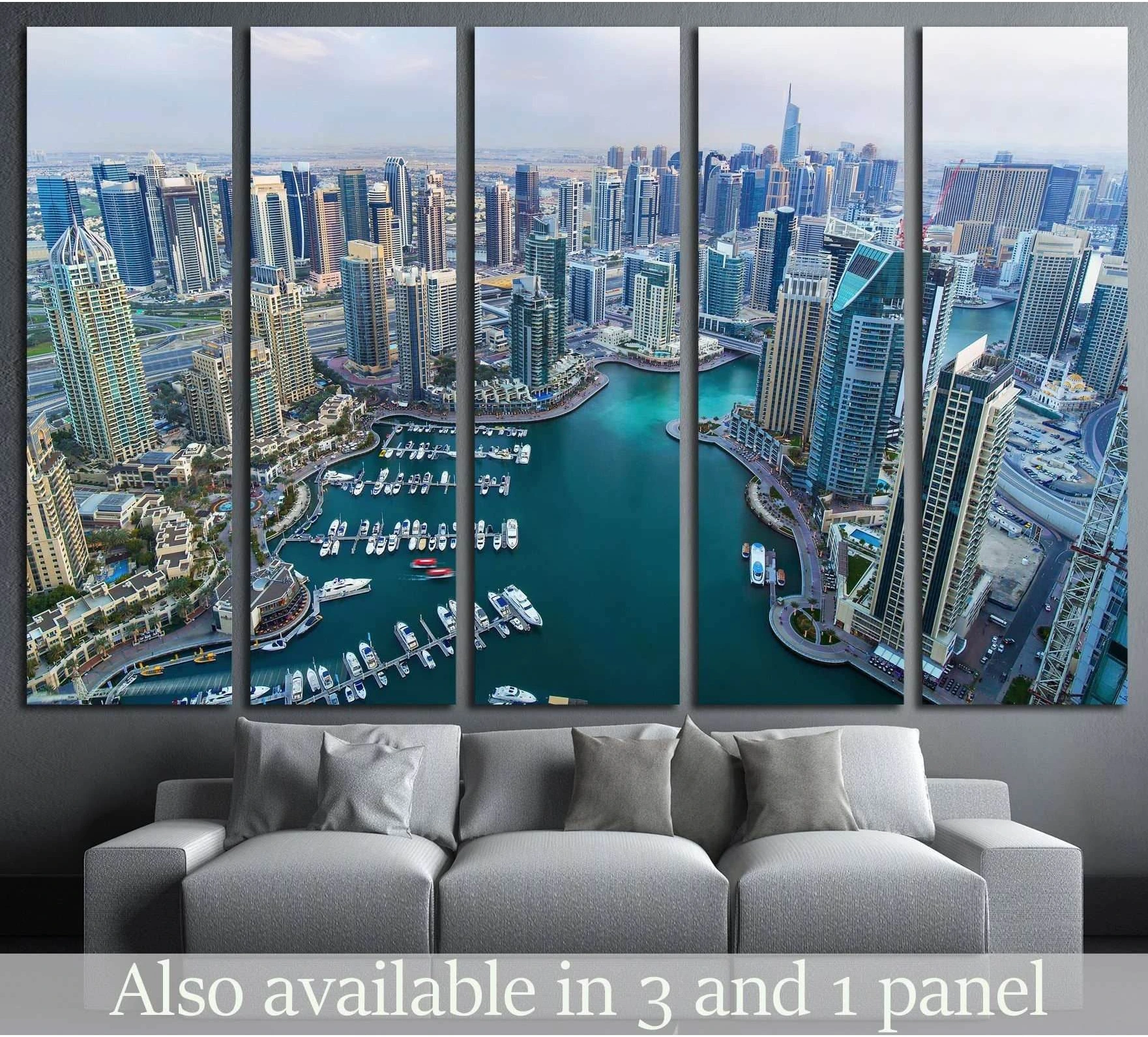 Dubai Marina skyline canvas print with yachts and turquoise water above a sofa in a modern living room