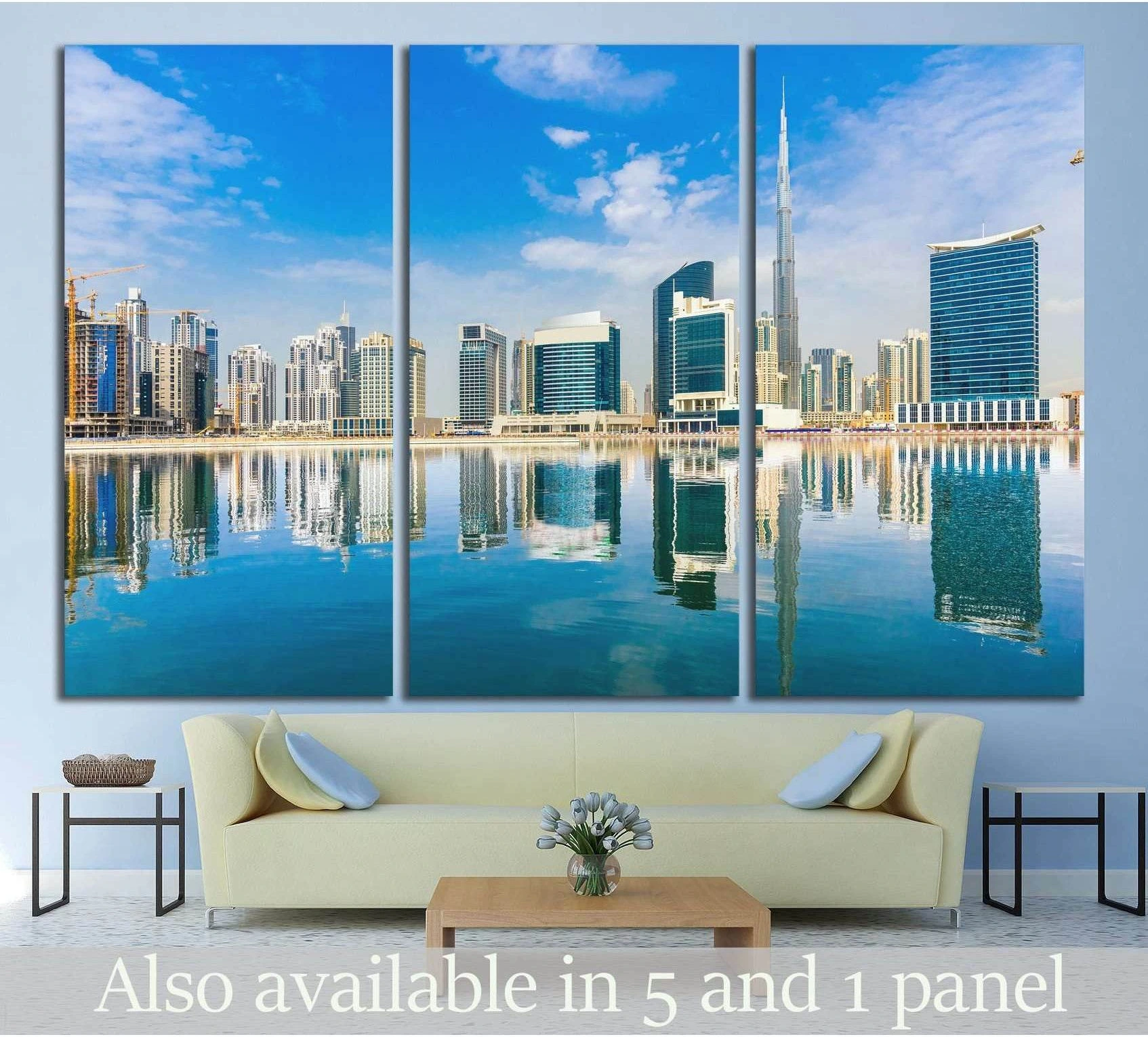 Dubai skyline triptych canvas print with Burj Khalifa and waterfront reflections above a sofa