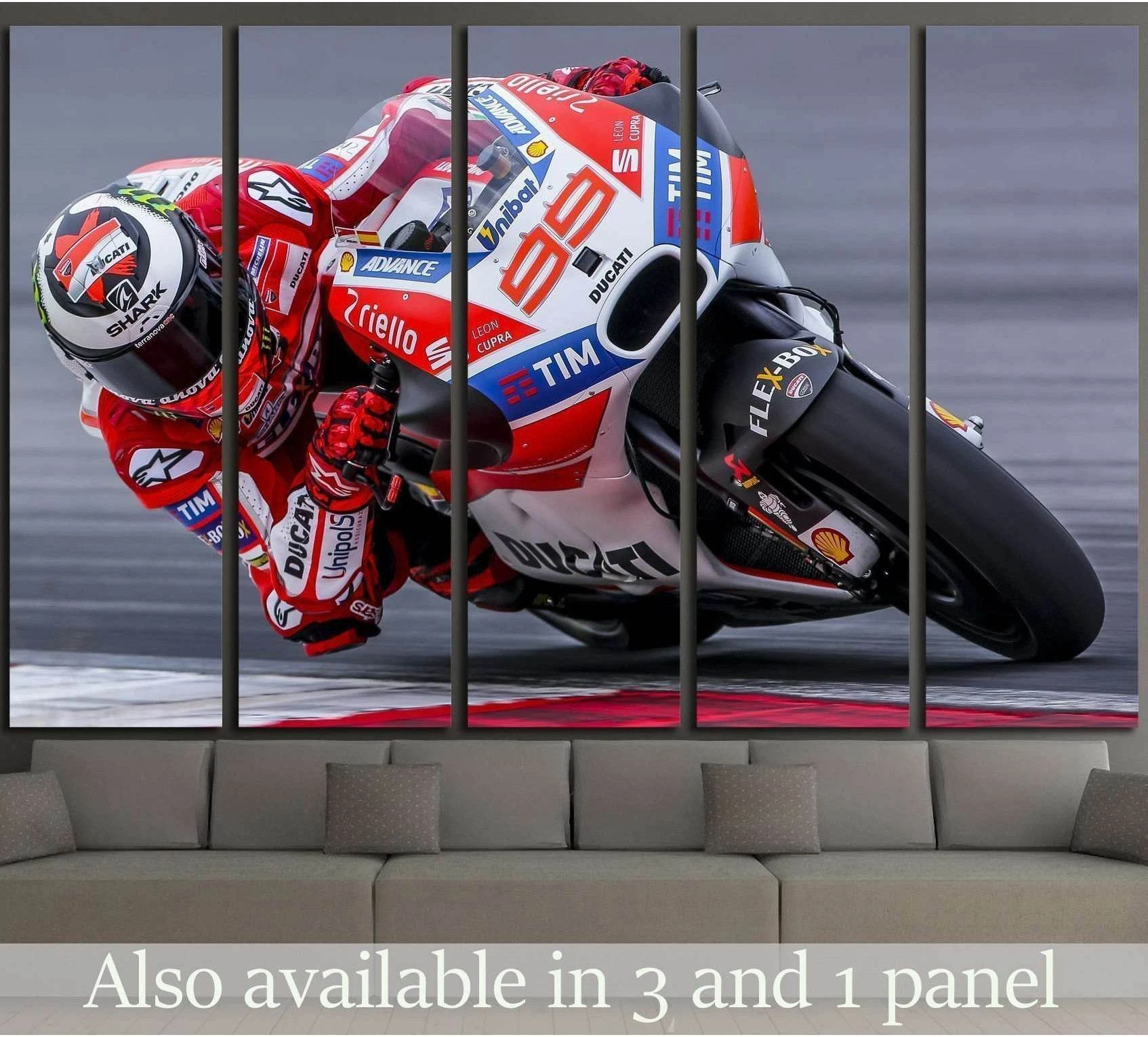 Jorge Lorenzo Ducati MotoGP canvas print with red racing bike leaned into a fast track corner above a sofa
