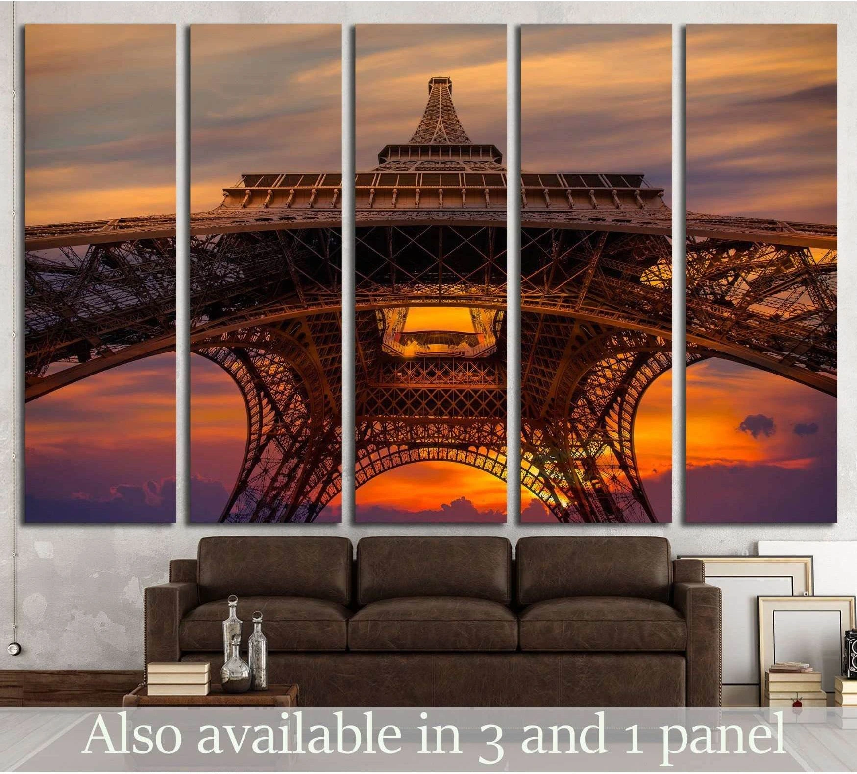 Eiffel Tower sunset canvas print in five panels above a sofa in a modern living room
