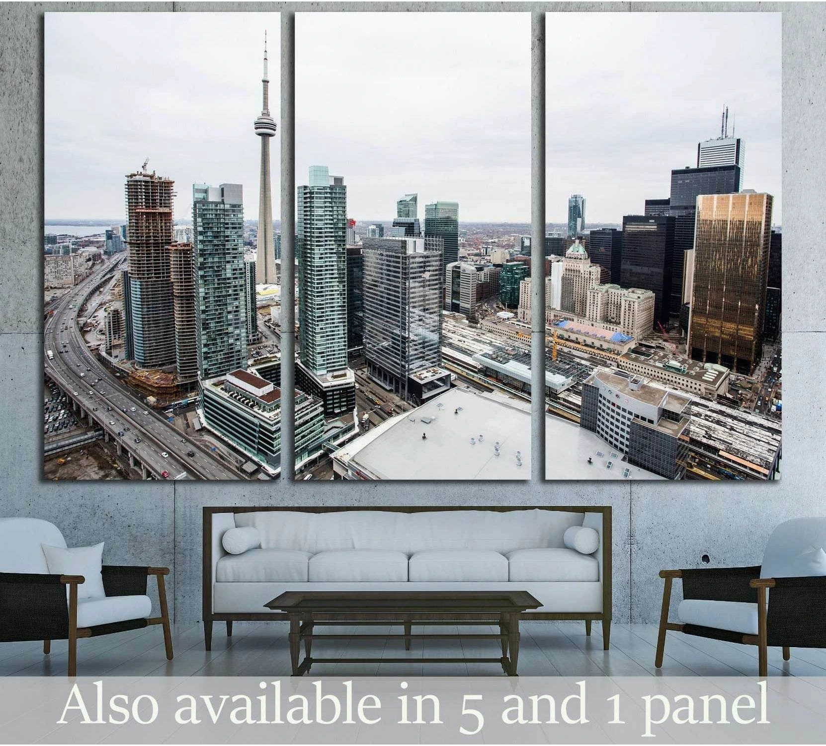 Toronto skyline triptych canvas print with CN Tower and downtown high-rises above a sofa