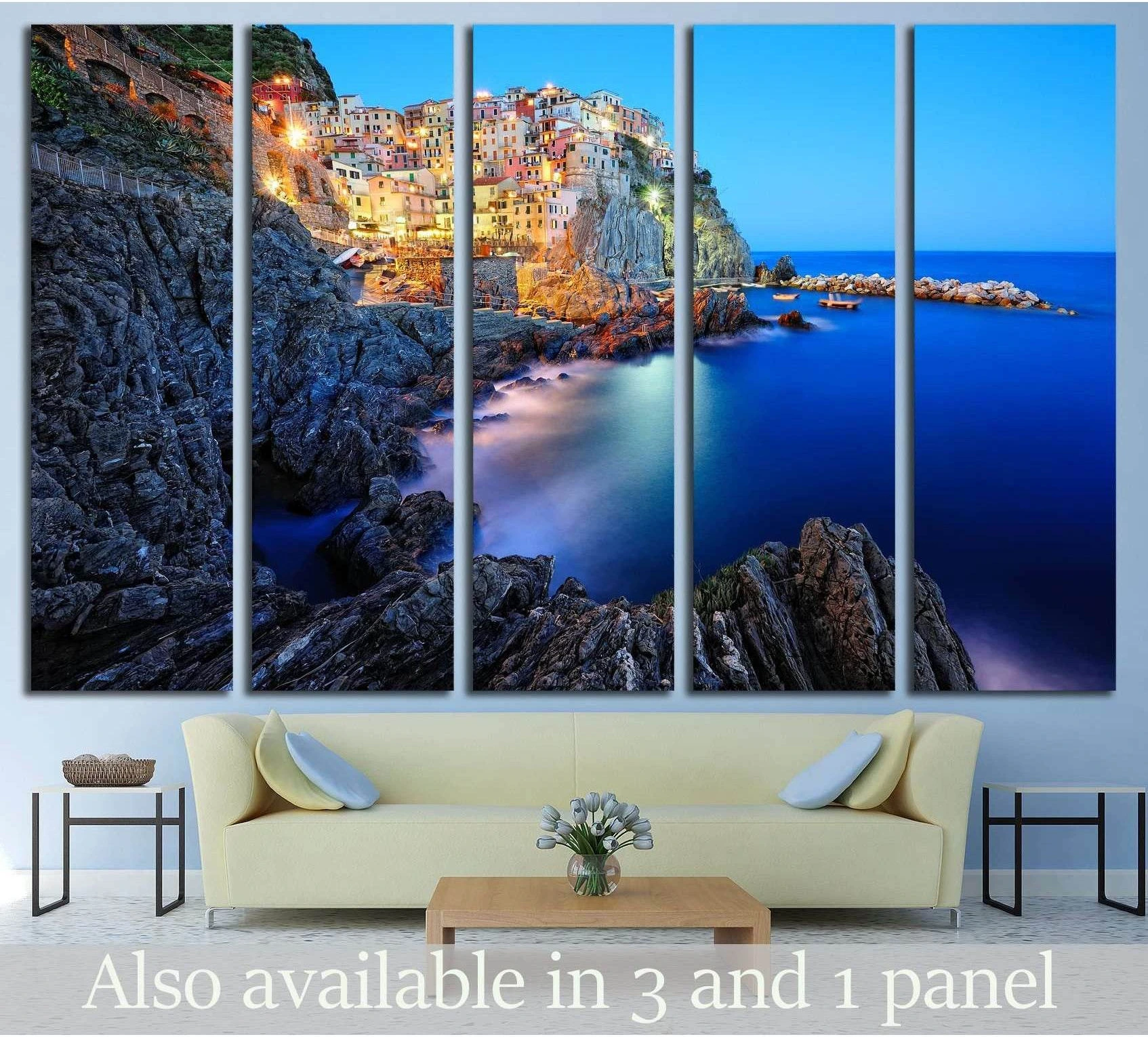 Manarola Cinque Terre canvas print with glowing cliffside village above deep blue sea at twilight
