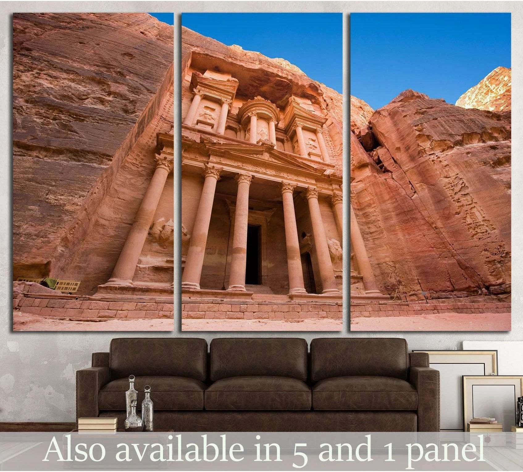 Petra Treasury canvas print showing the carved sandstone facade in Jordan above a sofa in a modern living room
