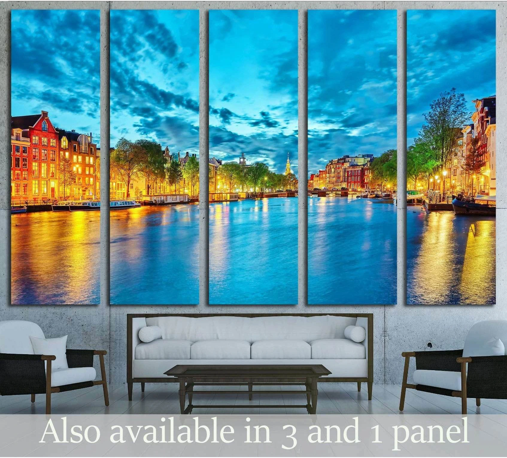 Amsterdam canal night canvas print in a five-panel living room mockup with blue water and glowing city lights