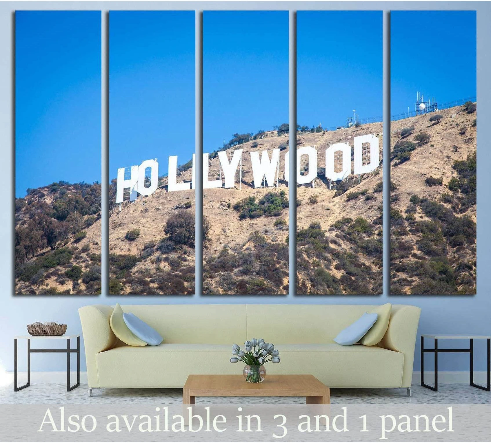 Hollywood Sign canvas print on sunlit Los Angeles hillside above sofa in modern living room