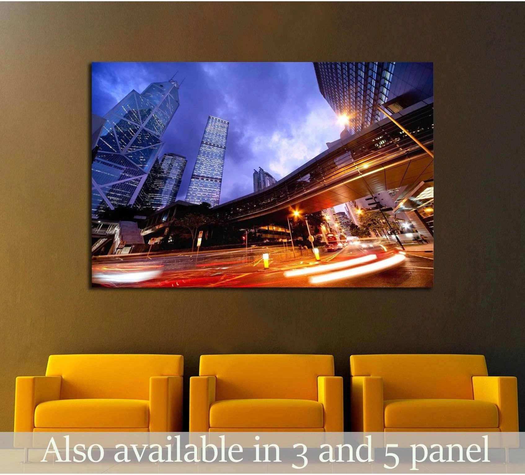 City night light trails canvas print with skyscrapers and fast traffic, hung above chairs in a modern office lobby