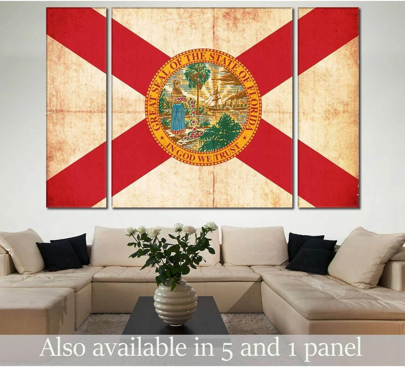 Vintage Florida flag triptych canvas print above beige sofa in a neutral living room