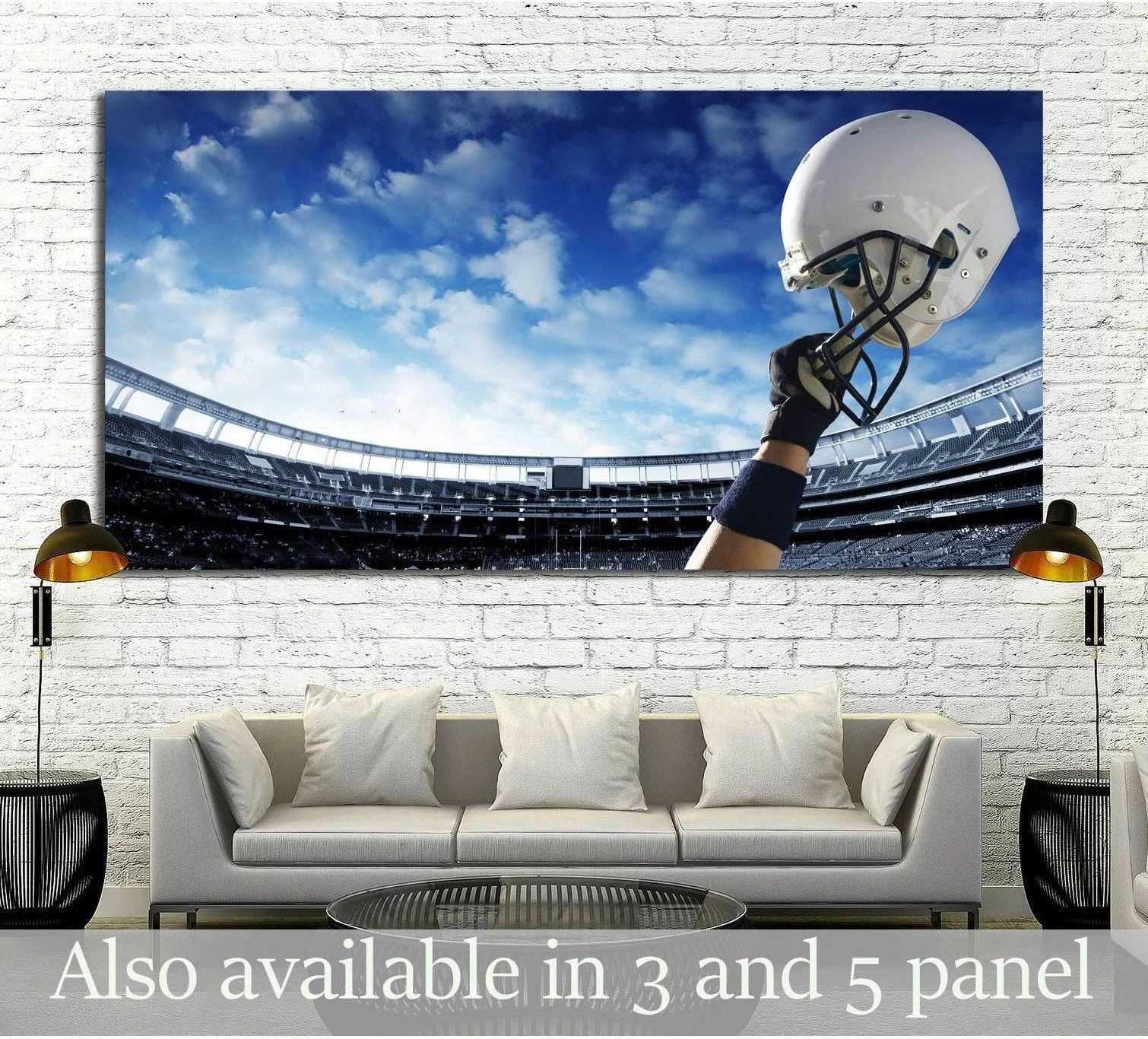Football helmet canvas print held high over a stadium, displayed above a sofa in a modern living room