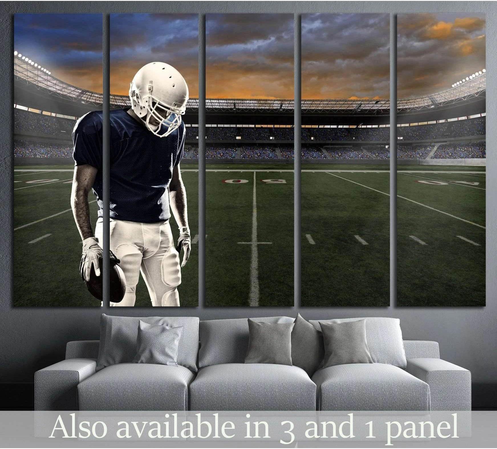 Football player canvas print in a stadium hung above a sofa in a modern game room