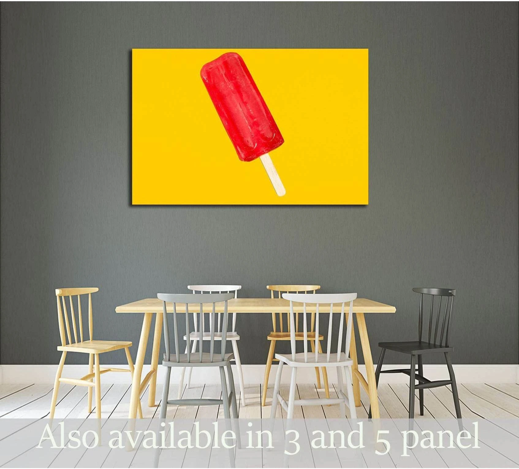 Red popsicle pop art canvas print on a yellow background displayed above a dining table