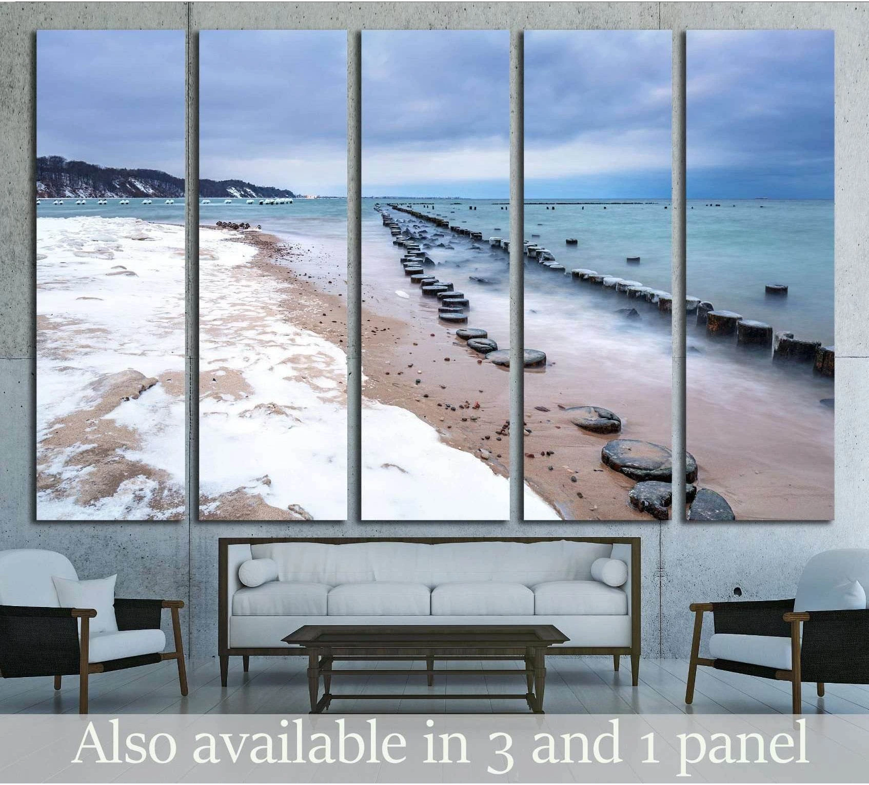 Frozen wooden breakwaters canvas print above sofa in modern living room, Babie Doly beach