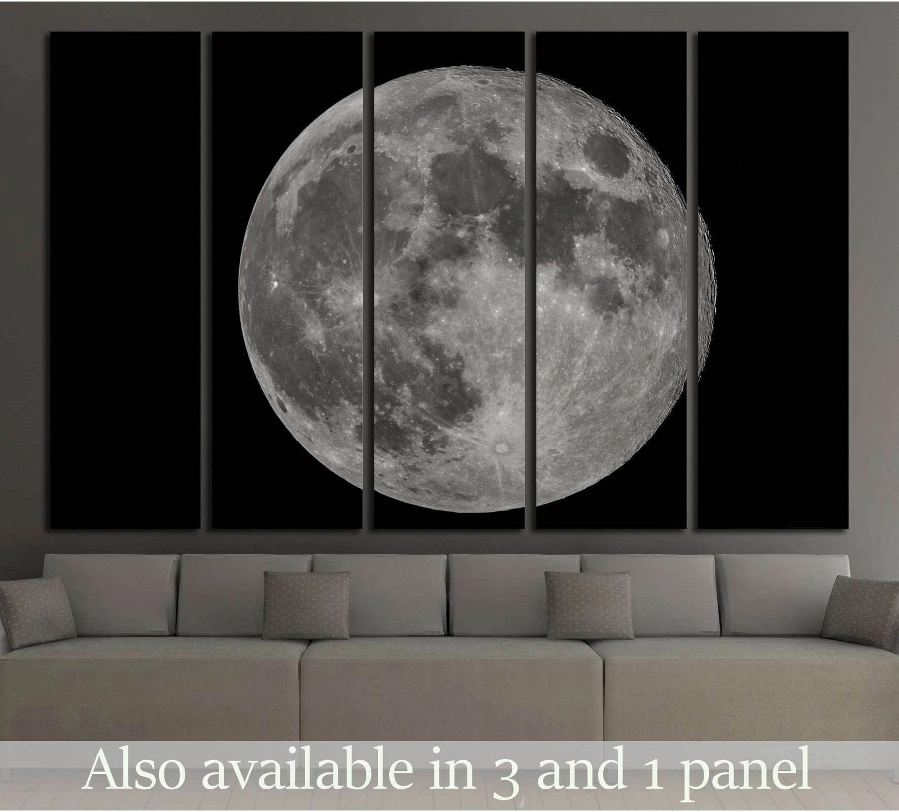 Five-panel full moon canvas print above sofa in a modern living room with black background