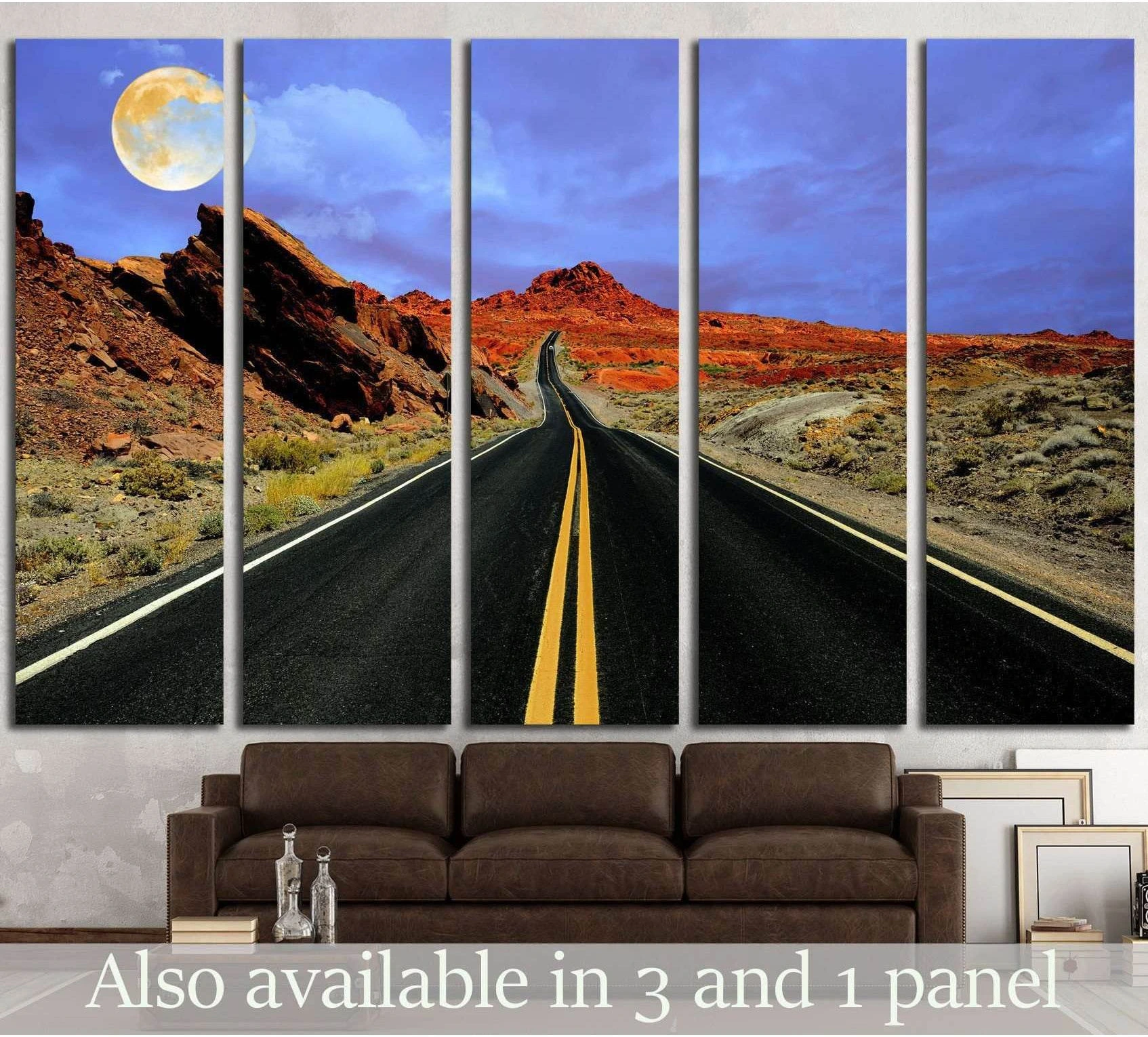 Full moon desert road canvas print above sofa with red rock landscape and deep blue sky