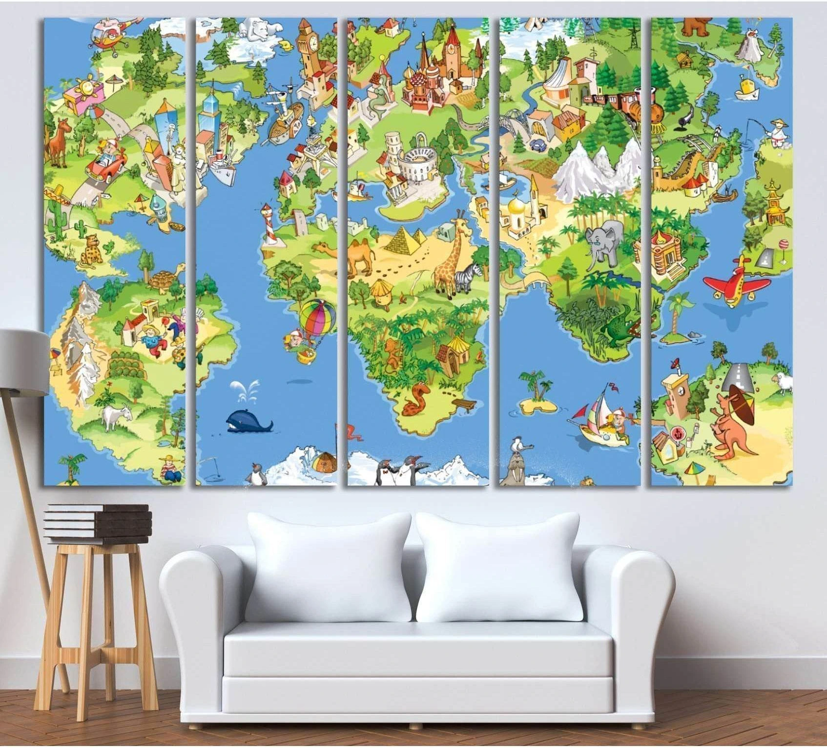 Colorful cartoon world map canvas print with animals and landmarks hung above a sofa in a kids room