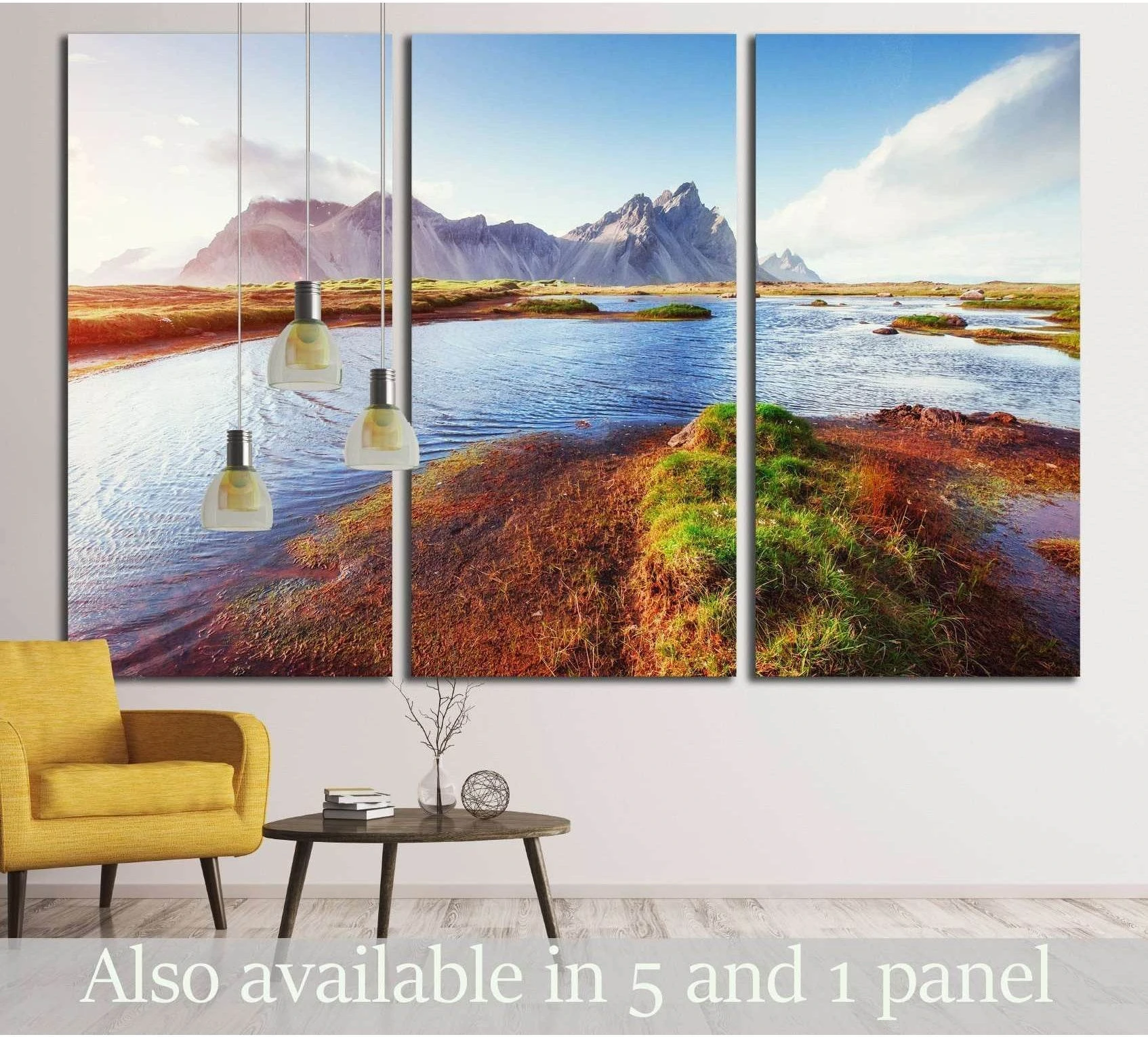 Triptych glacial mountain canvas print above sofa with blue water, marshland, and distant peaks