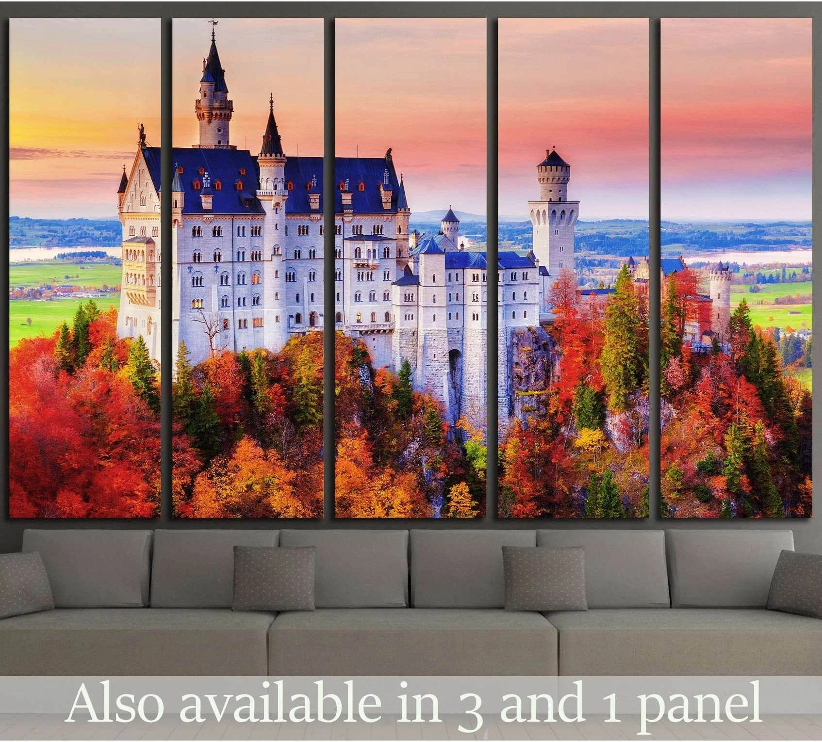Neuschwanstein Castle canvas print above sofa with autumn forest and pink sunset sky