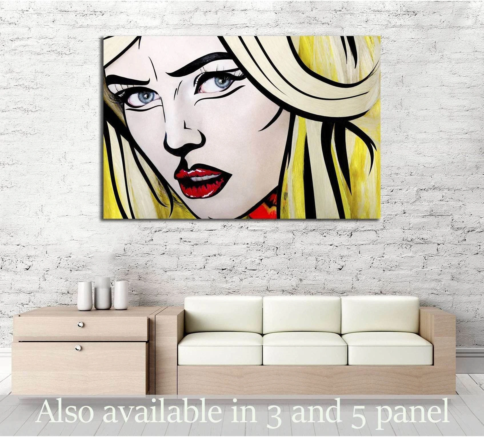 Blonde woman pop art canvas print with red lips above a sofa in a modern living room