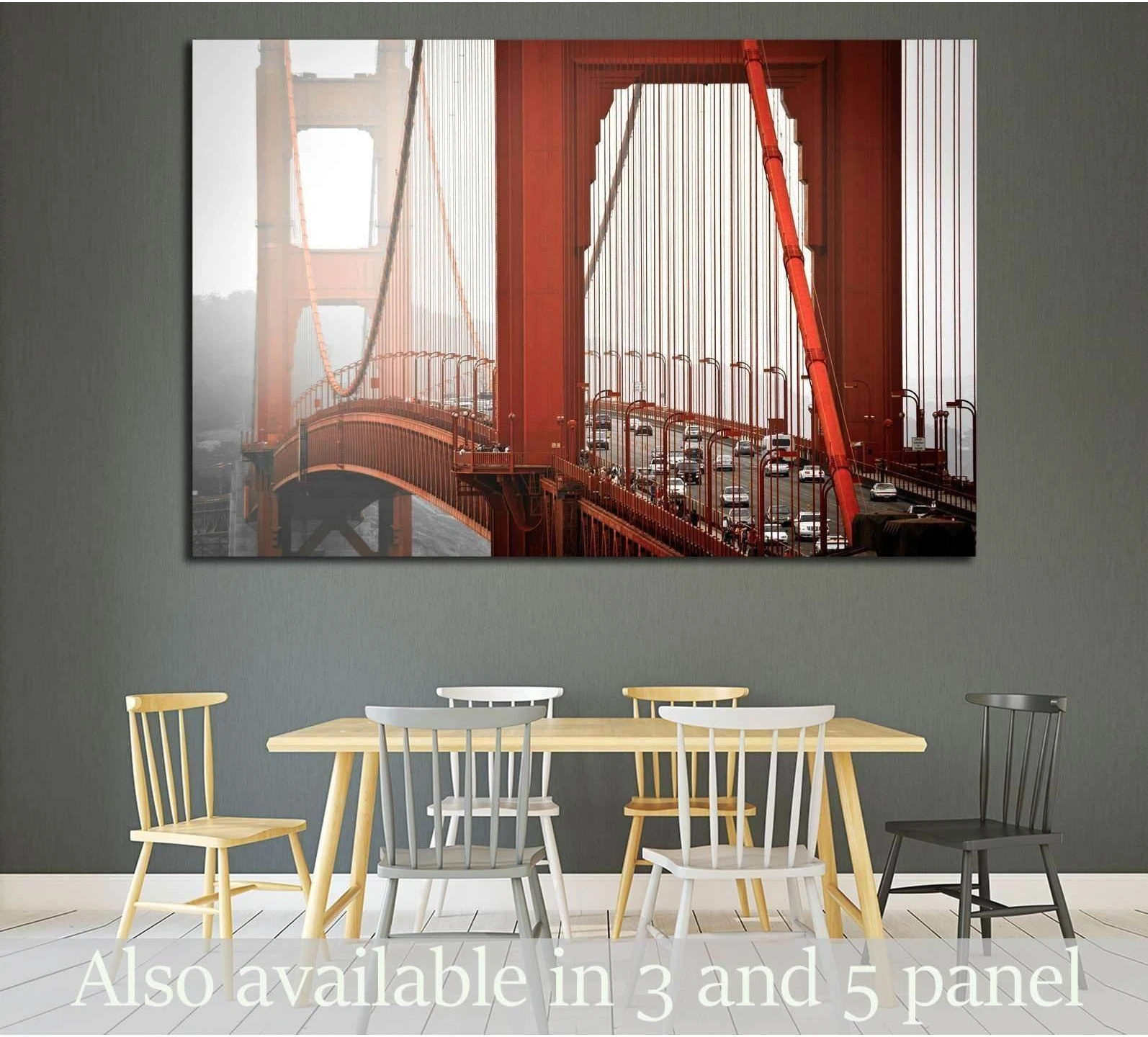 Golden Gate Bridge canvas print with orange suspension cables above a dining table in a modern room