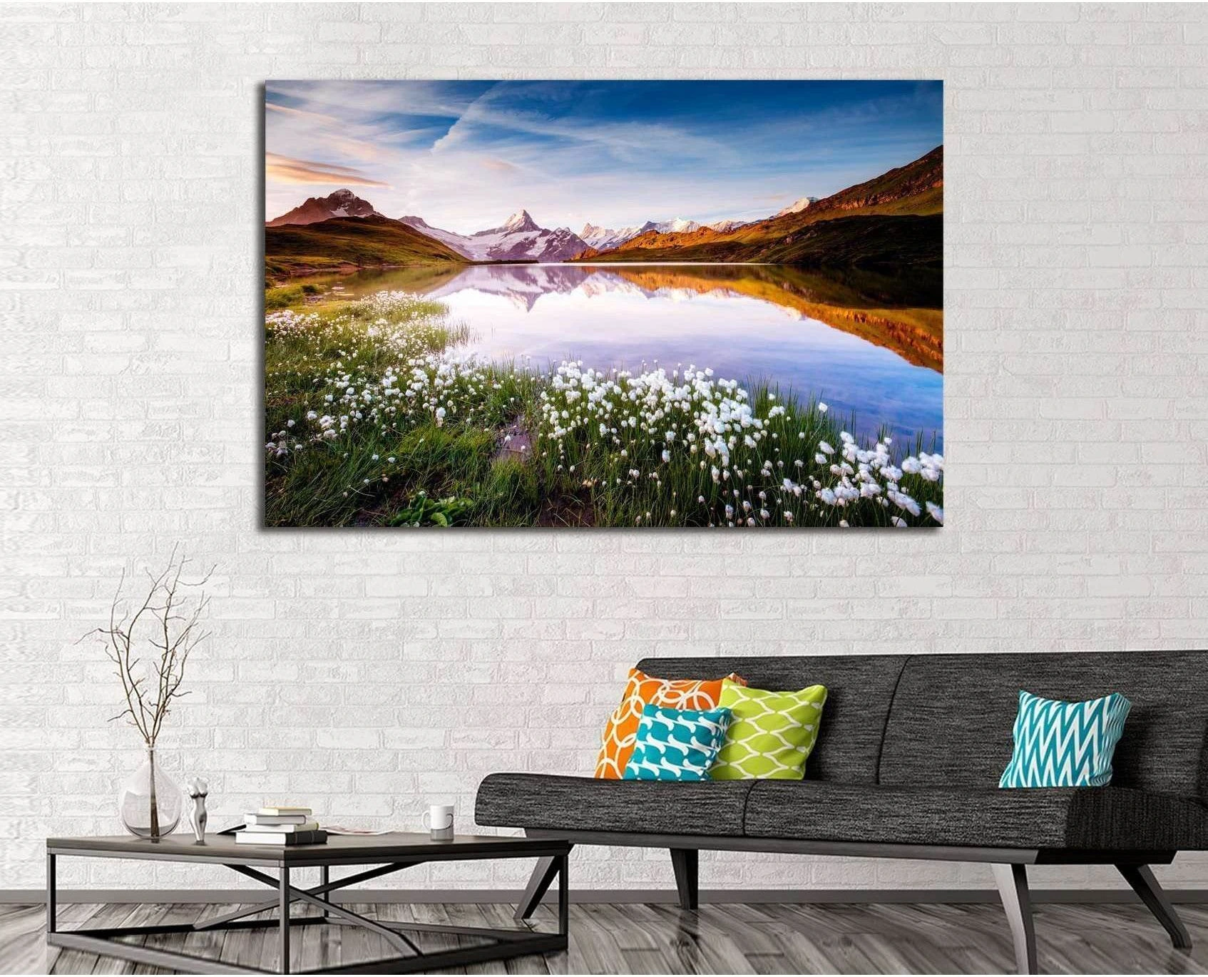 Bachalpsee Lake canvas print with Bernese Alps reflection above sofa in a modern living room