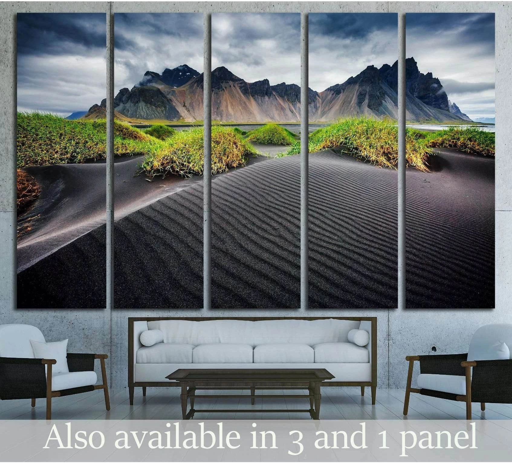 Black sand beach canvas print with rippled dunes and mountain backdrop above sofa
