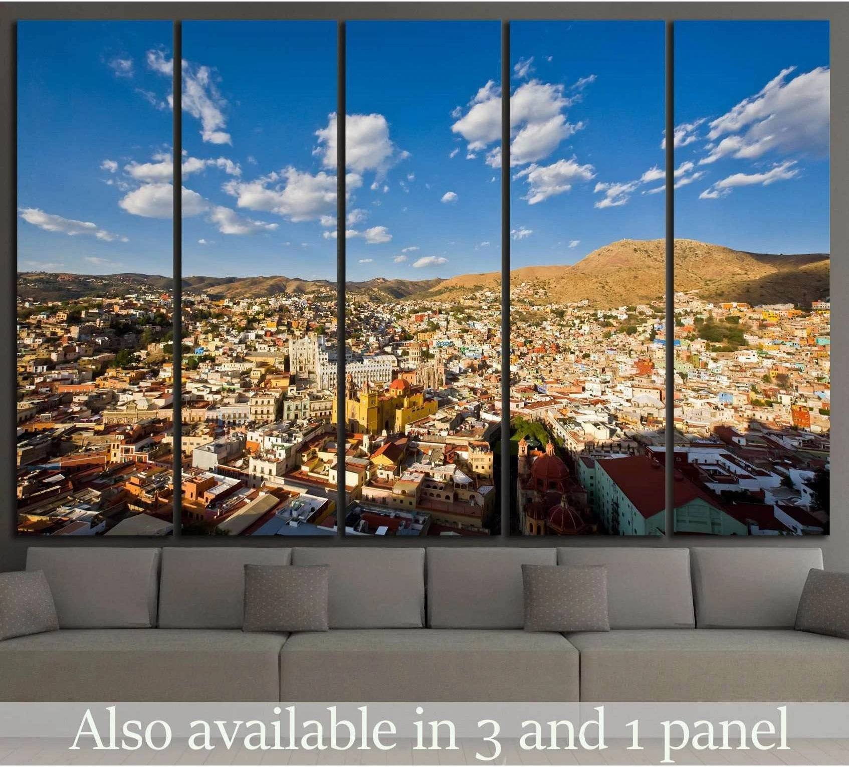 Guanajuato city canvas print with colorful hillside houses displayed above a sofa