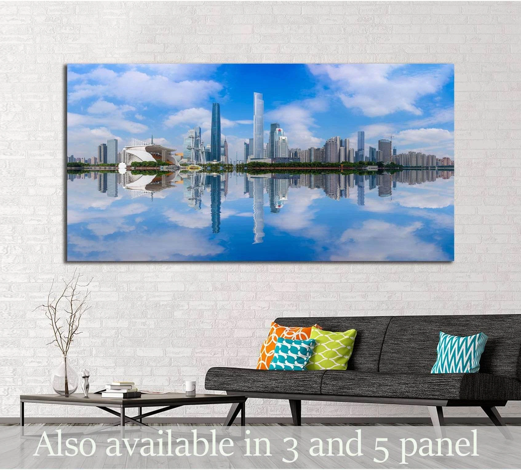 Guangzhou skyline canvas print with mirrored river reflections and blue sky above a sofa