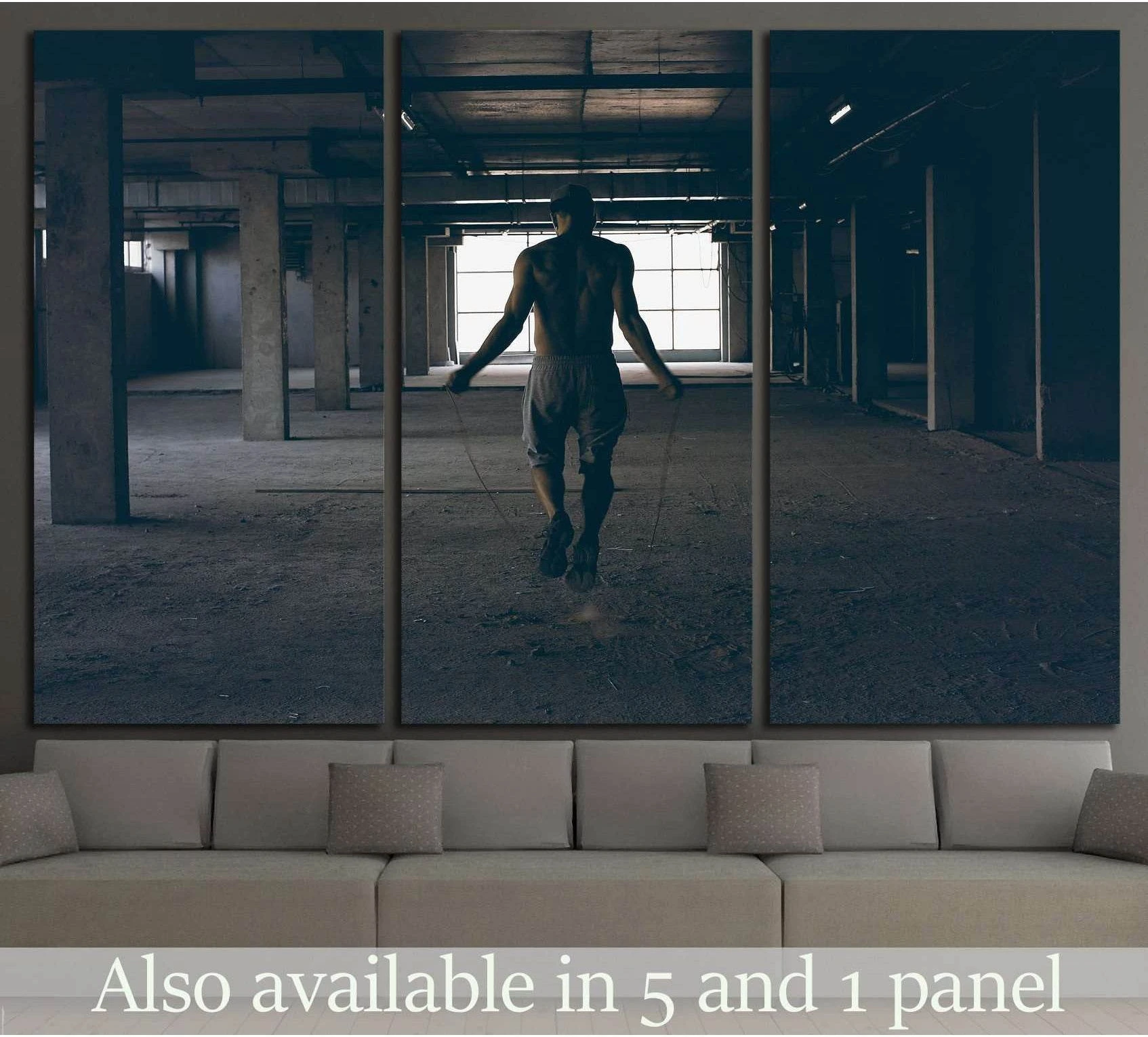 Black and white jump rope canvas print with male athlete in an industrial gym interior