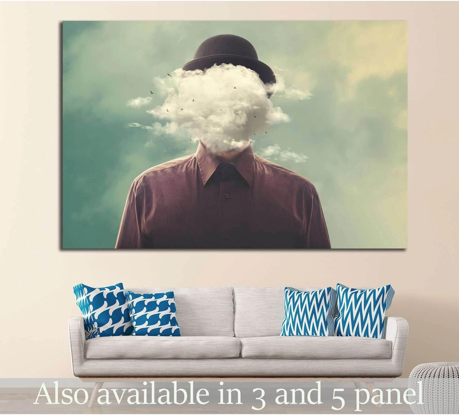 Surreal cloud face canvas print with bowler hat portrait above a sofa in a modern living room