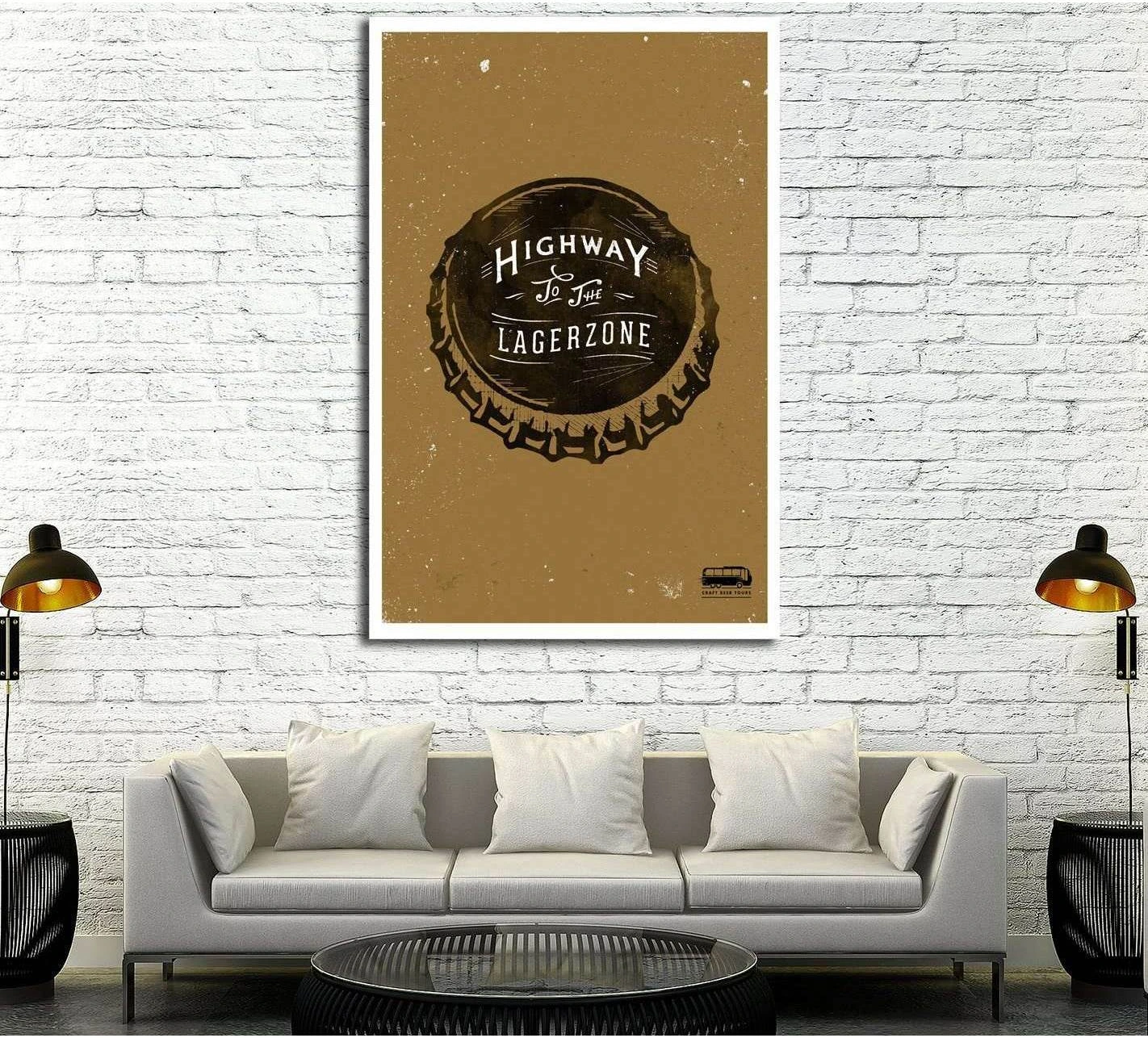 Retro beer canvas print with bottle cap graphic and tan background above sofa on white brick wall