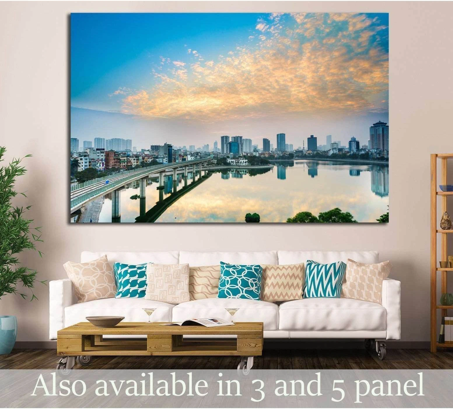 Hanoi cityscape canvas print with Hoang Cau Lake skyline reflection at sunset, hung above a sofa in a modern living room
