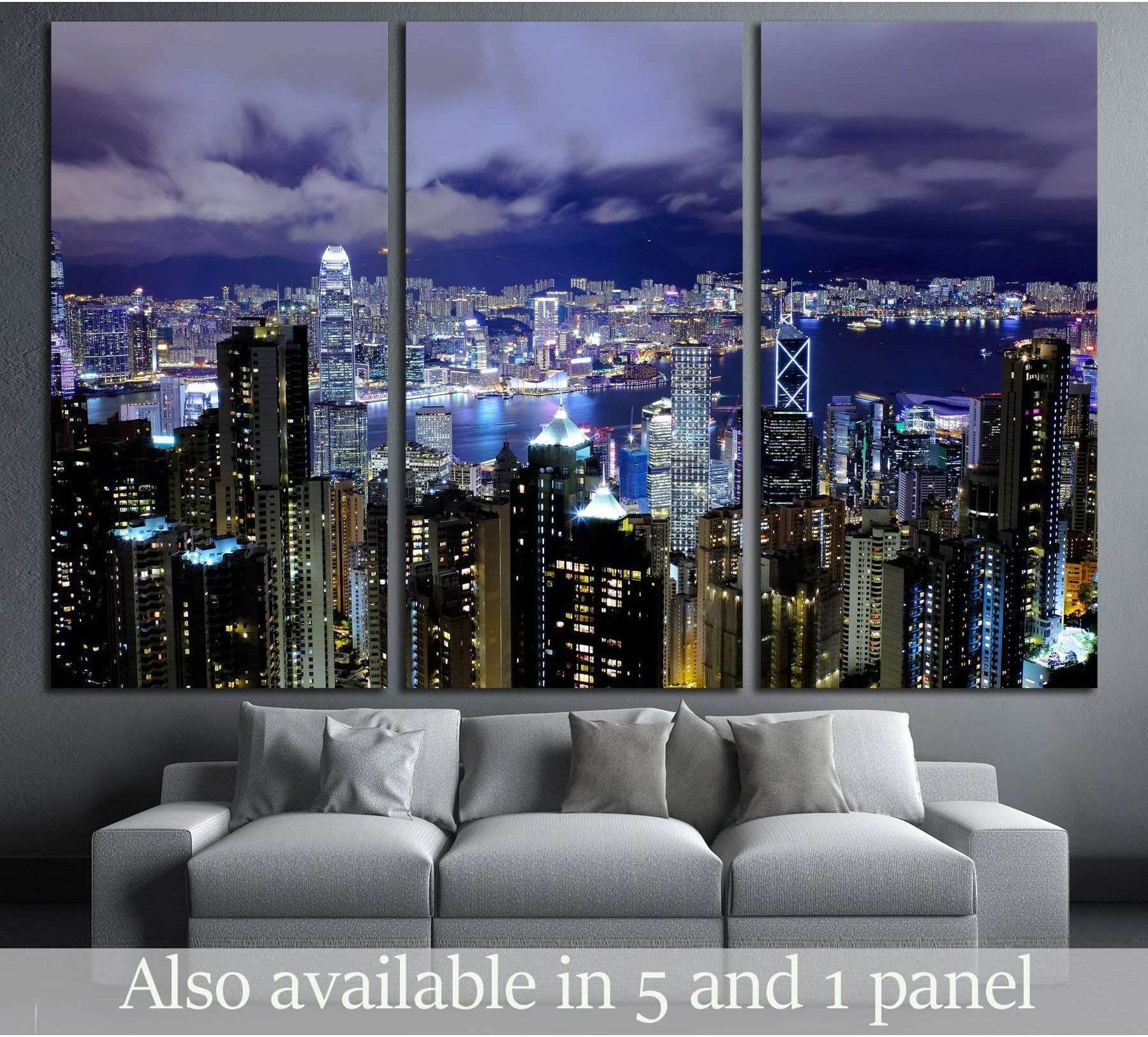 Hong Kong night skyline triptych canvas print above sofa in a modern living room