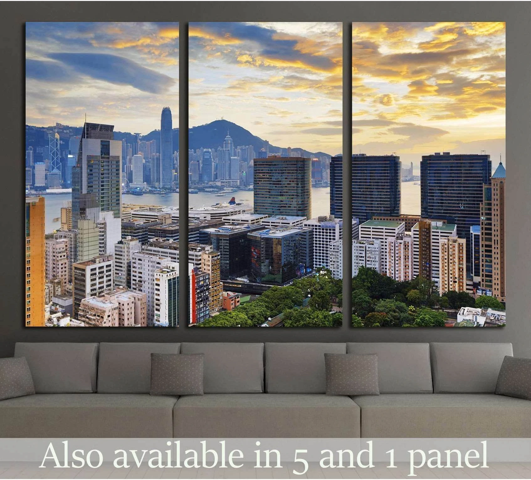 Hong Kong skyline canvas print over a sofa with Victoria Harbour, towers, and golden sunset sky