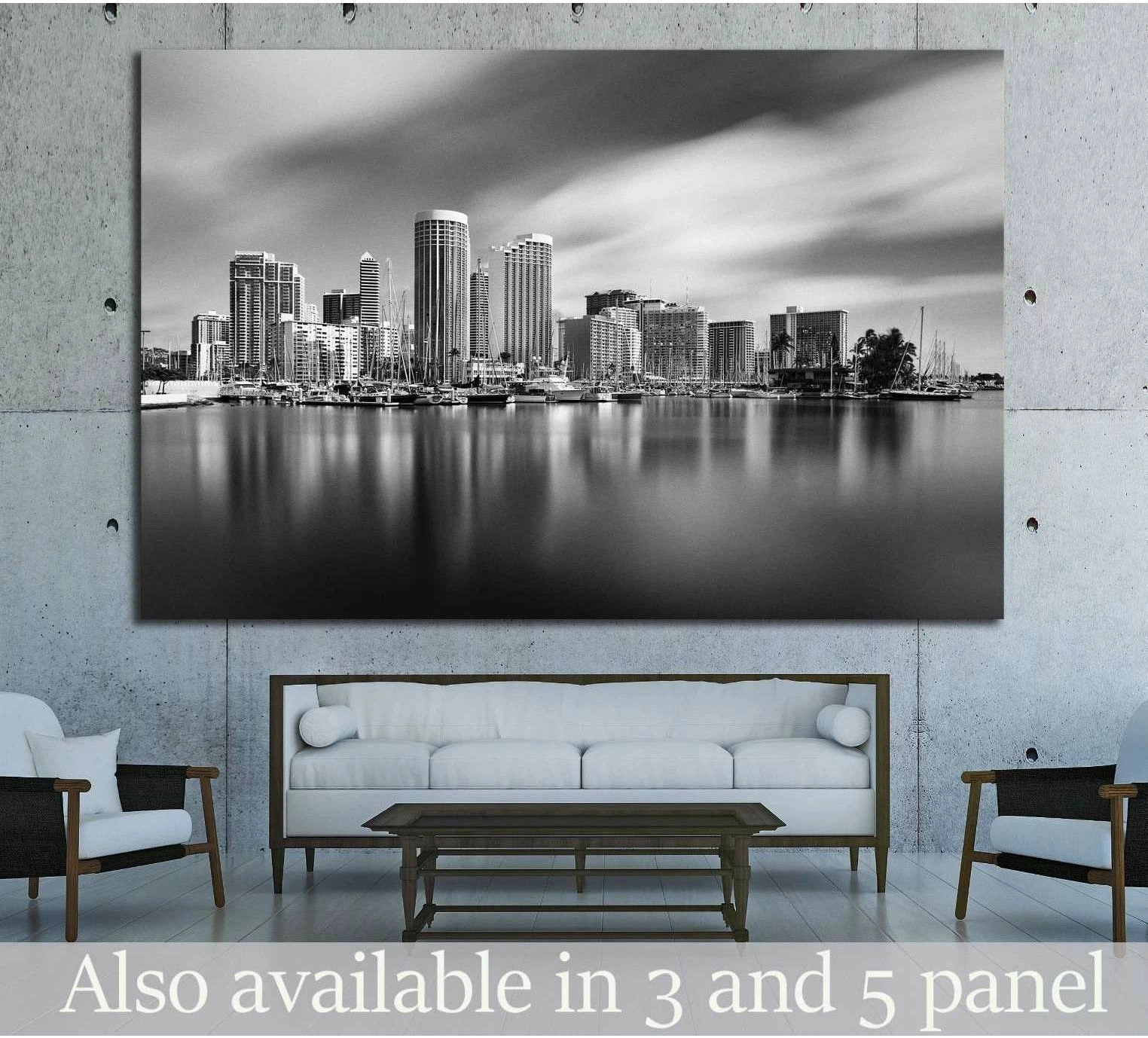 Black and white Honolulu skyline canvas print above a sofa in a modern living room