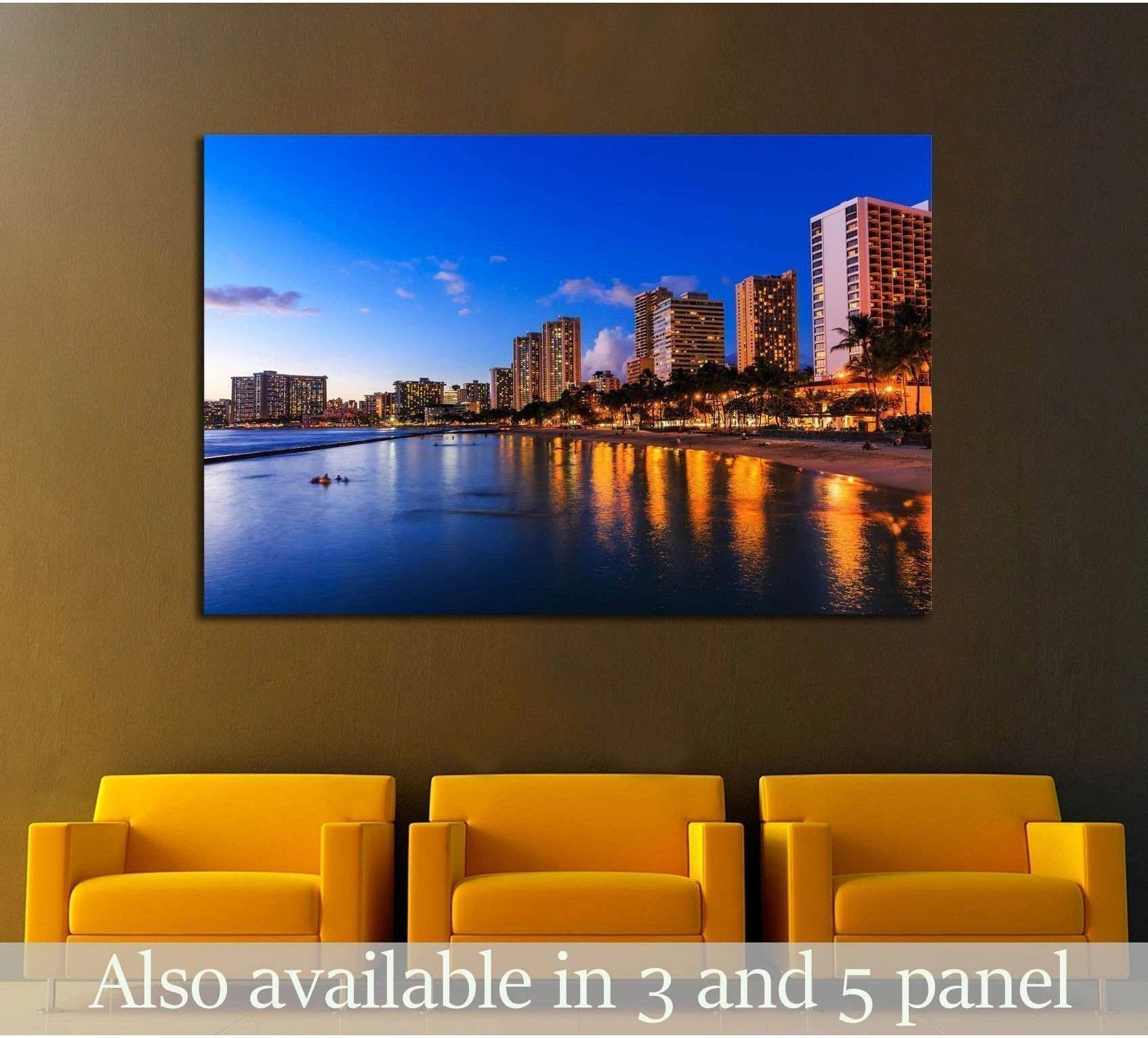 Honolulu skyline canvas print showing Waikiki Beach at twilight above chairs in a modern room
