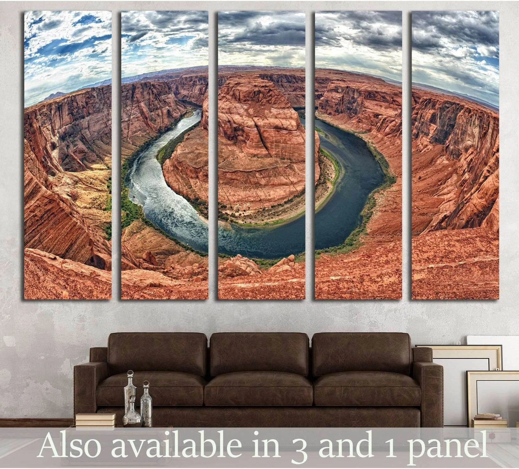 Five-panel Horseshoe Bend canvas print above a brown sofa in a modern living room
