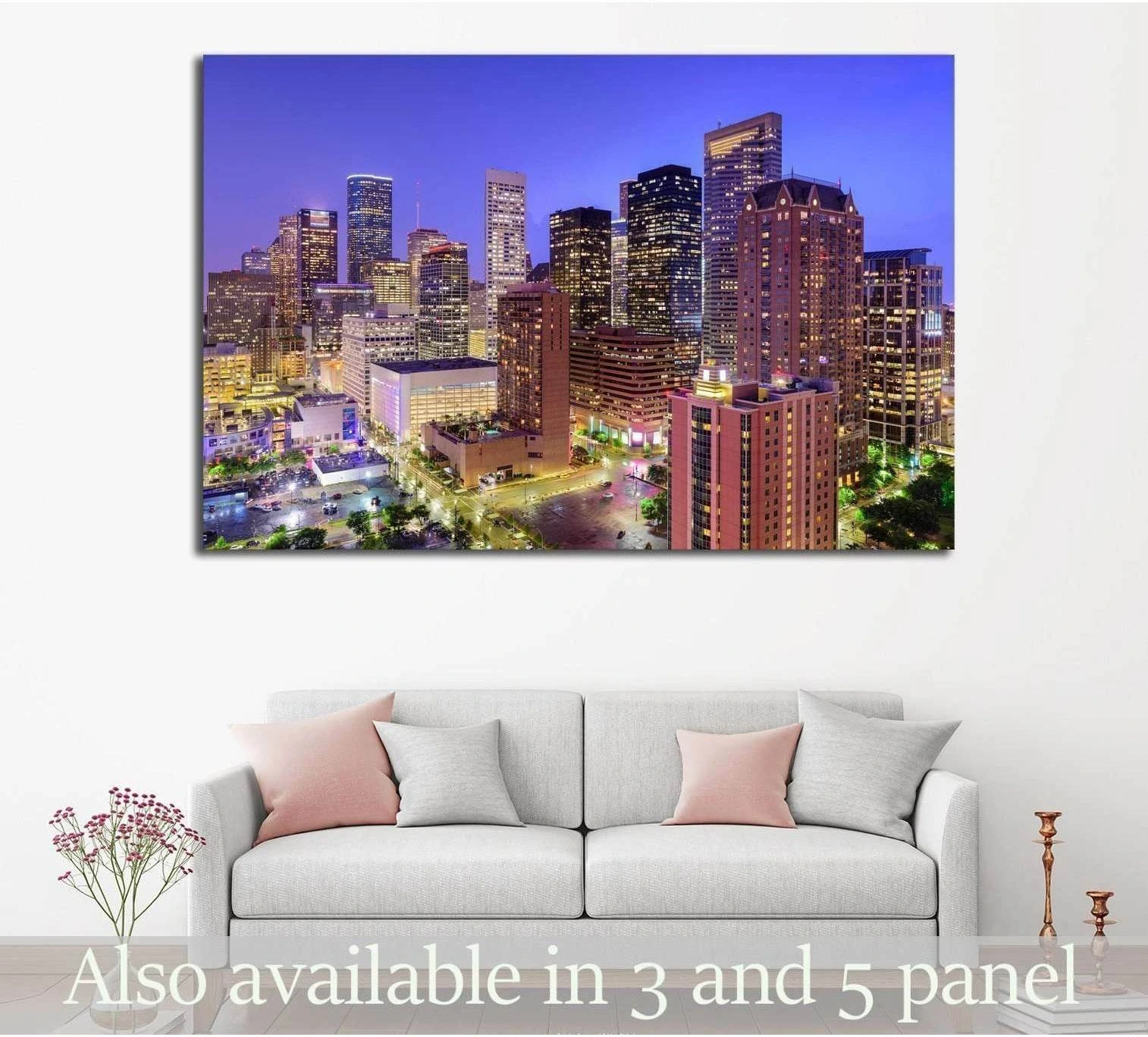 Houston skyline canvas print hung above a sofa in a modern living room with downtown towers at dusk