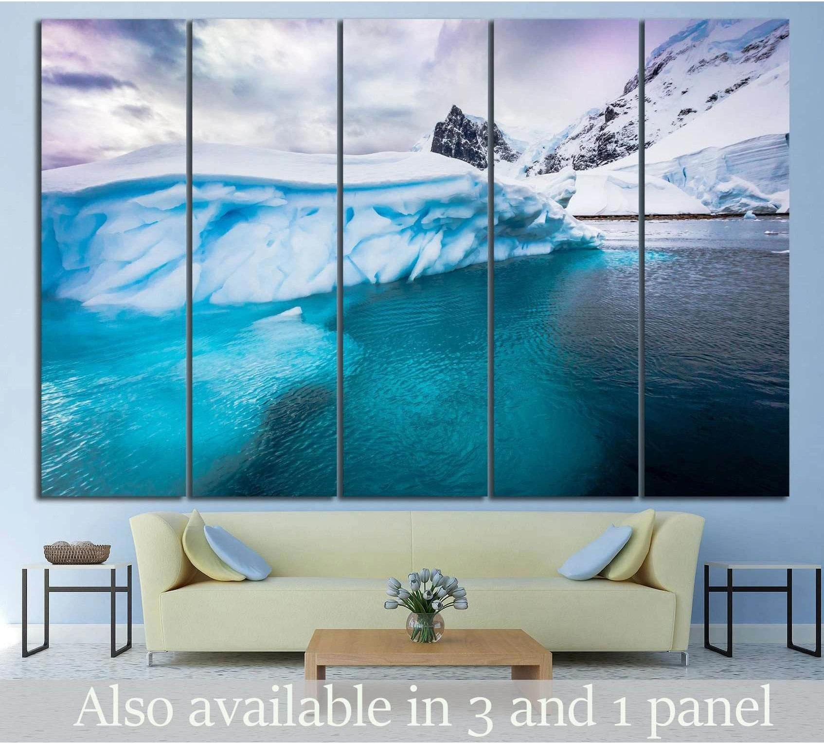 Antarctica iceberg canvas print above a sofa, featuring turquoise glacier water and snowy mountains in a modern living room