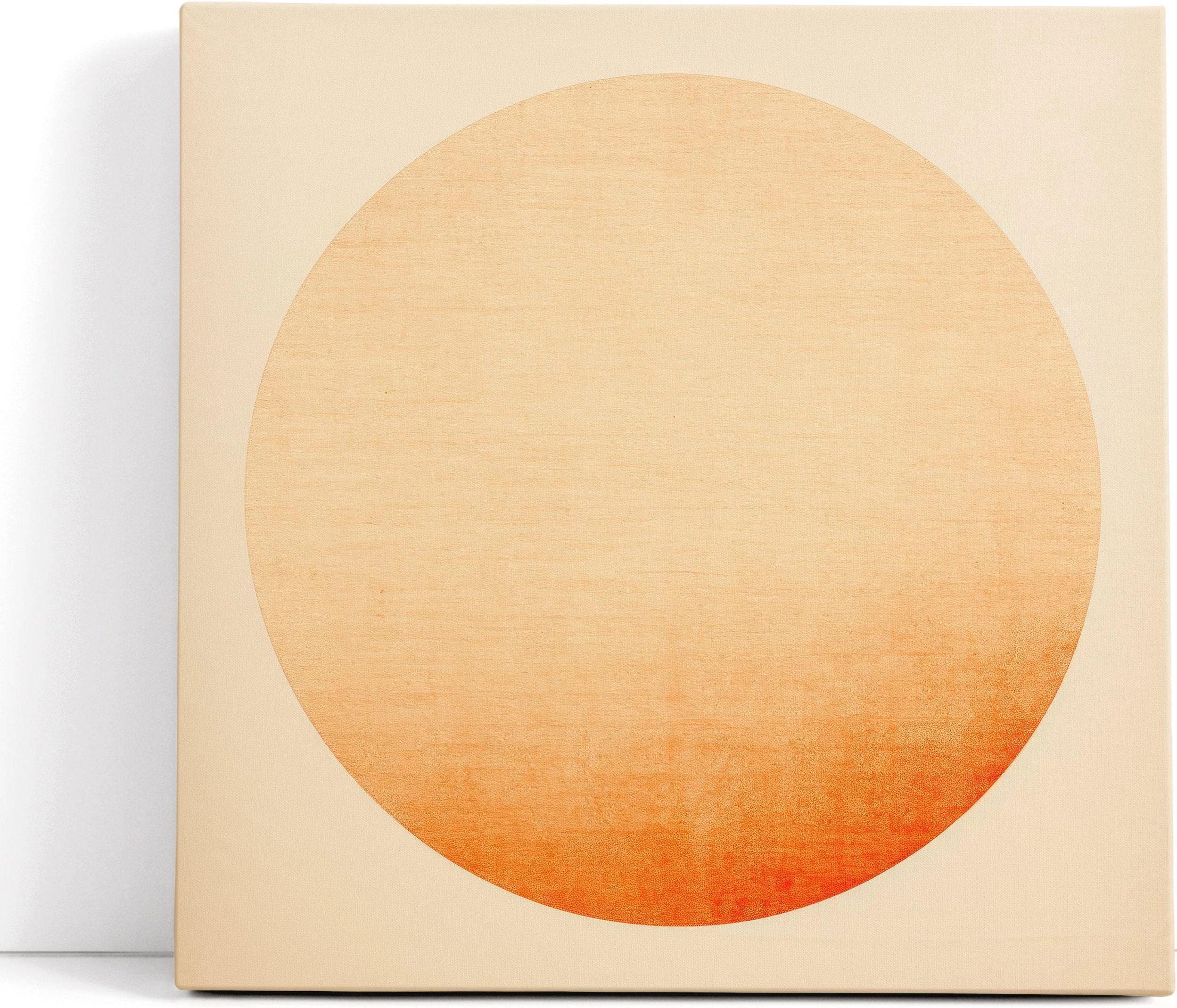Peach and cream abstract circle gradient on a light cream background detail view