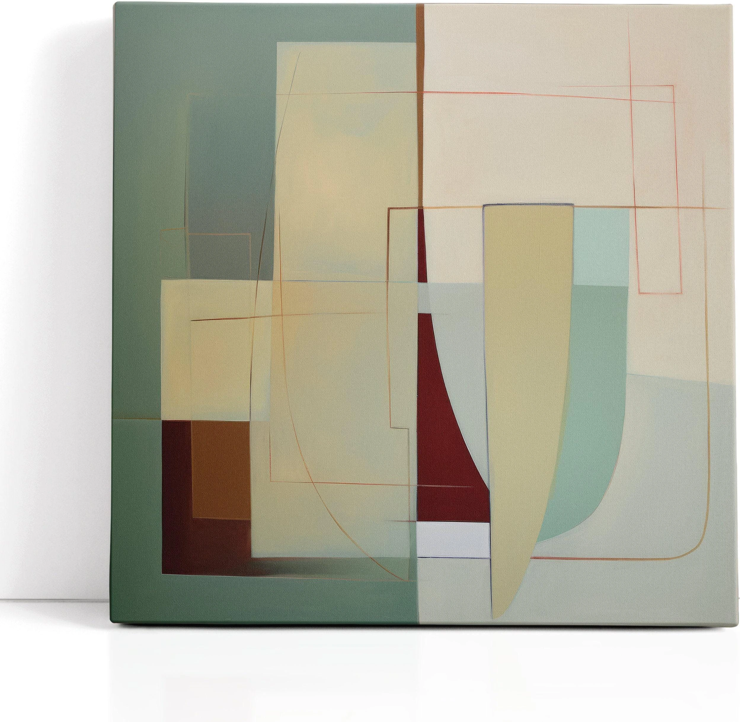 A framed abstract geometric composition combines muted sage and terracotta blocks with cream and burgundy lines in a balanced, mid-century style