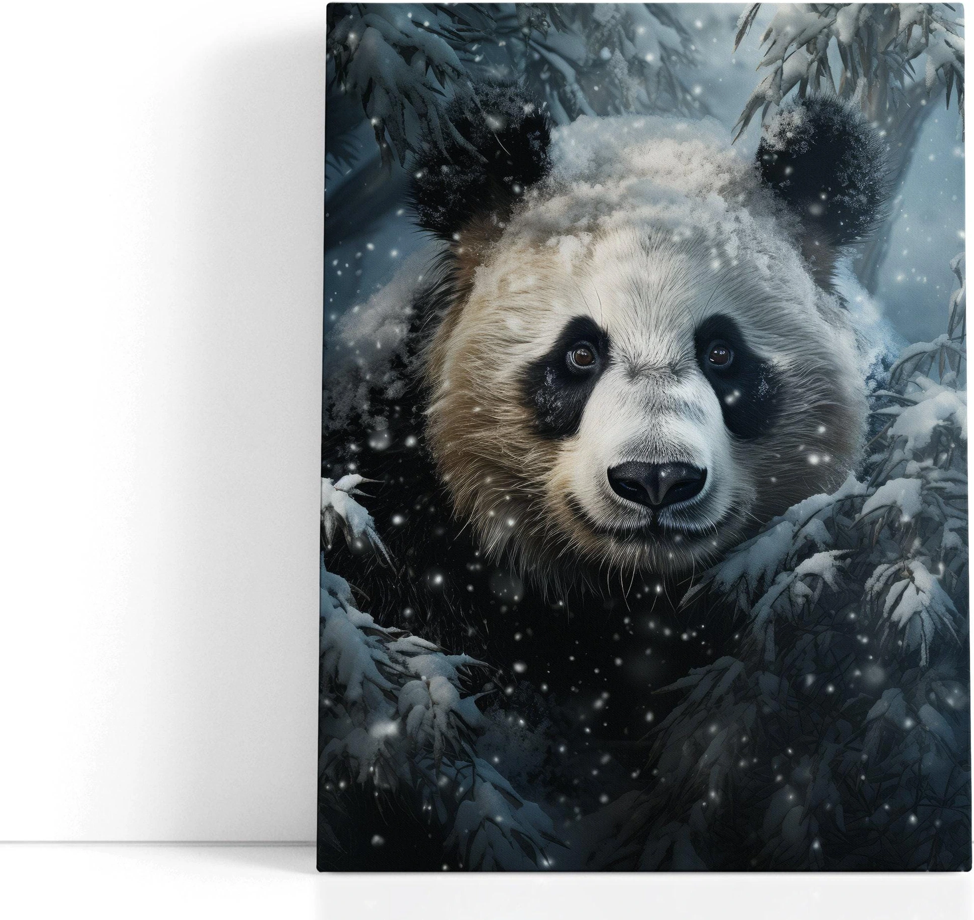 Snowy panda face artwork with falling snow and dark evergreen trees detail view