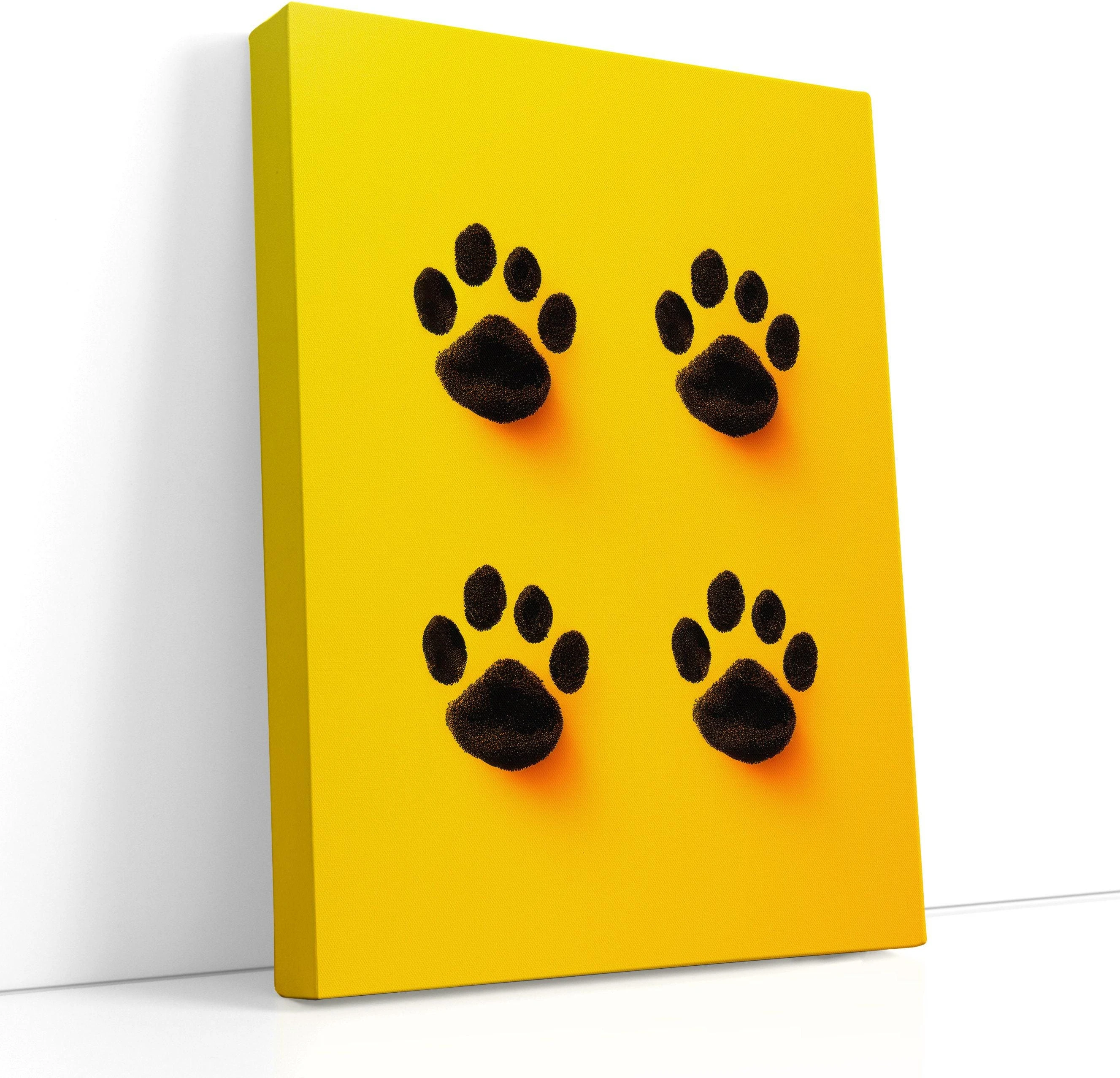 Mustard yellow artwork with four black paw prints arranged in a symmetrical pattern