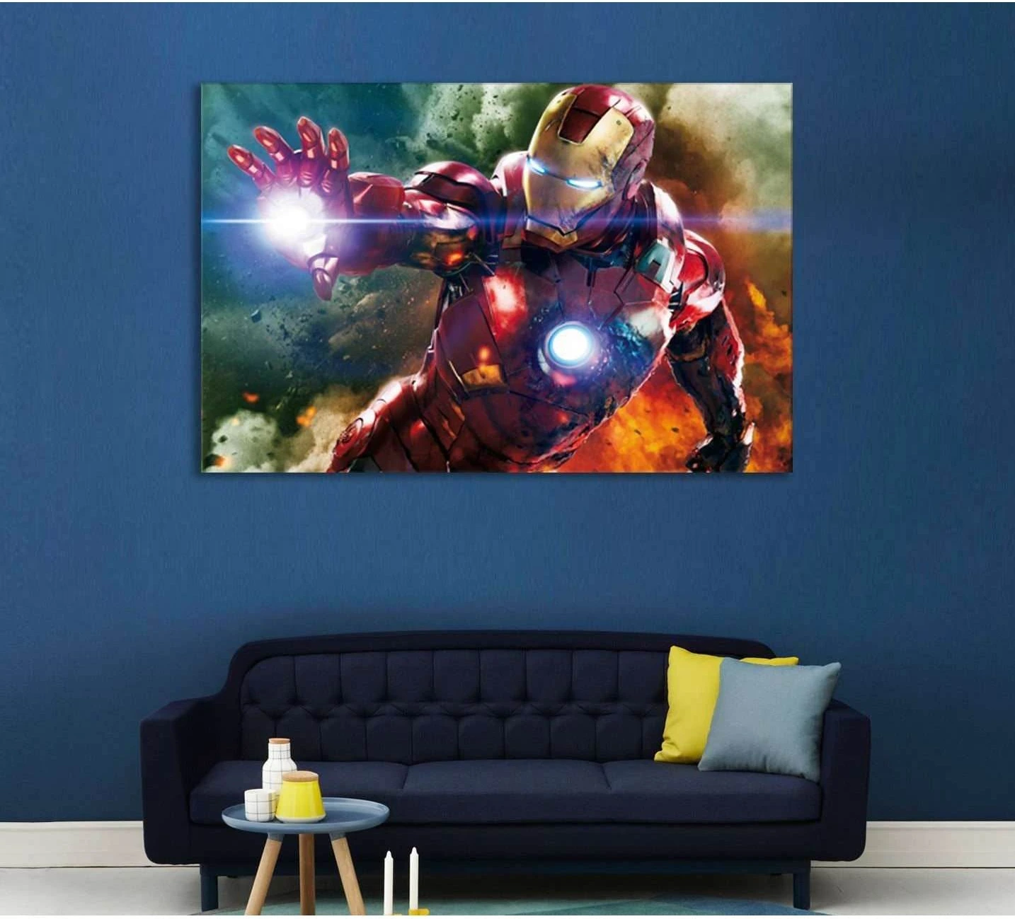 Iron Man canvas print with glowing arc reactor and repulsor blast above a sofa in a modern living room