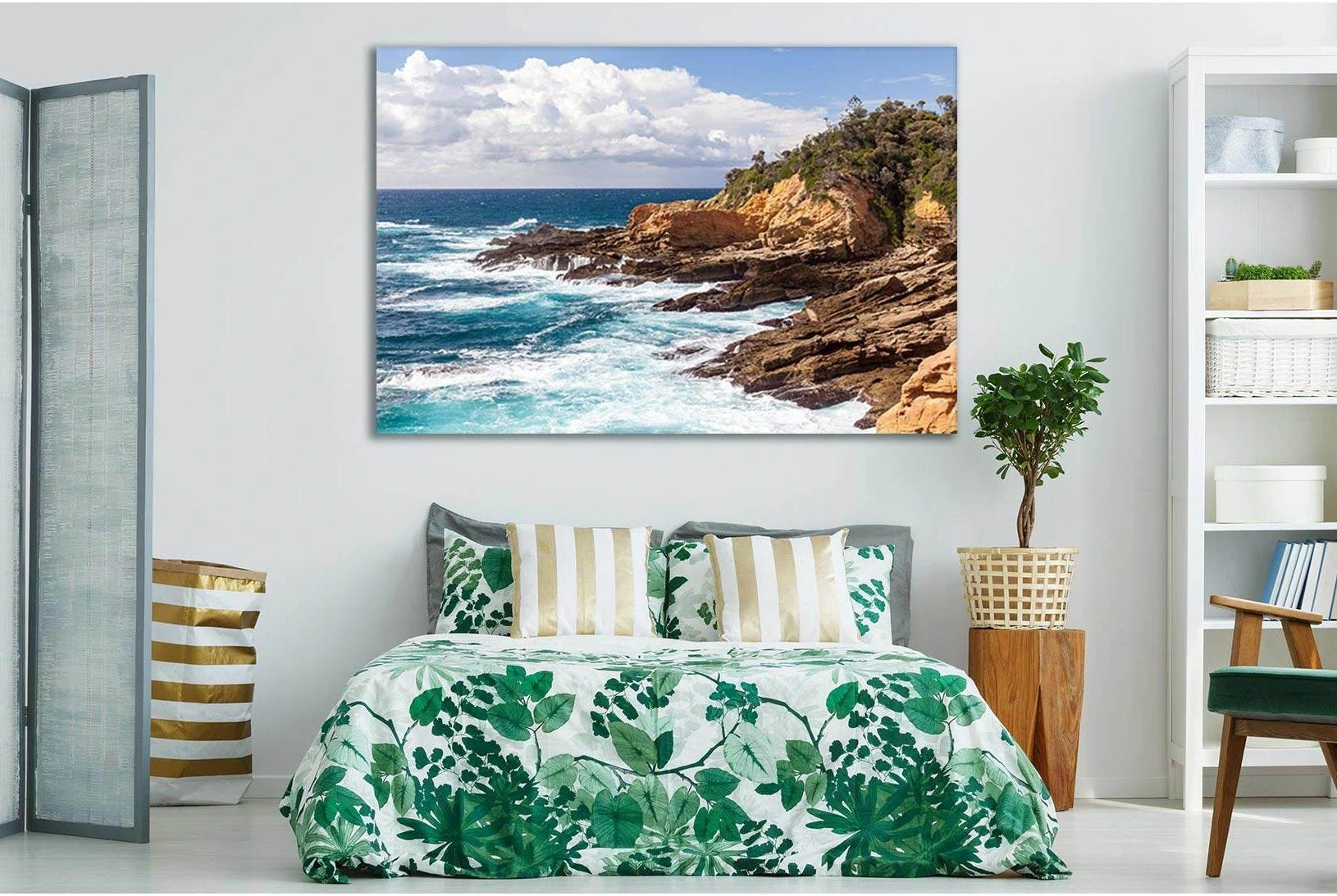 Blue Ocean Waves Over Rocky Coast Canvas Print showing ocean water, wave movement and surf.