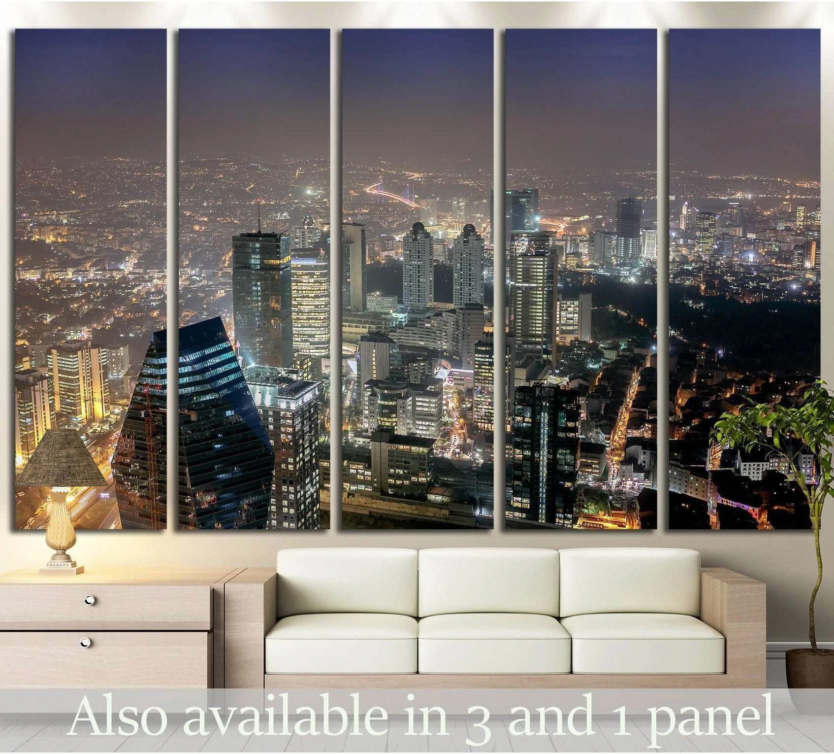 Istanbul skyline canvas print with glowing night city lights above sofa in a modern living room