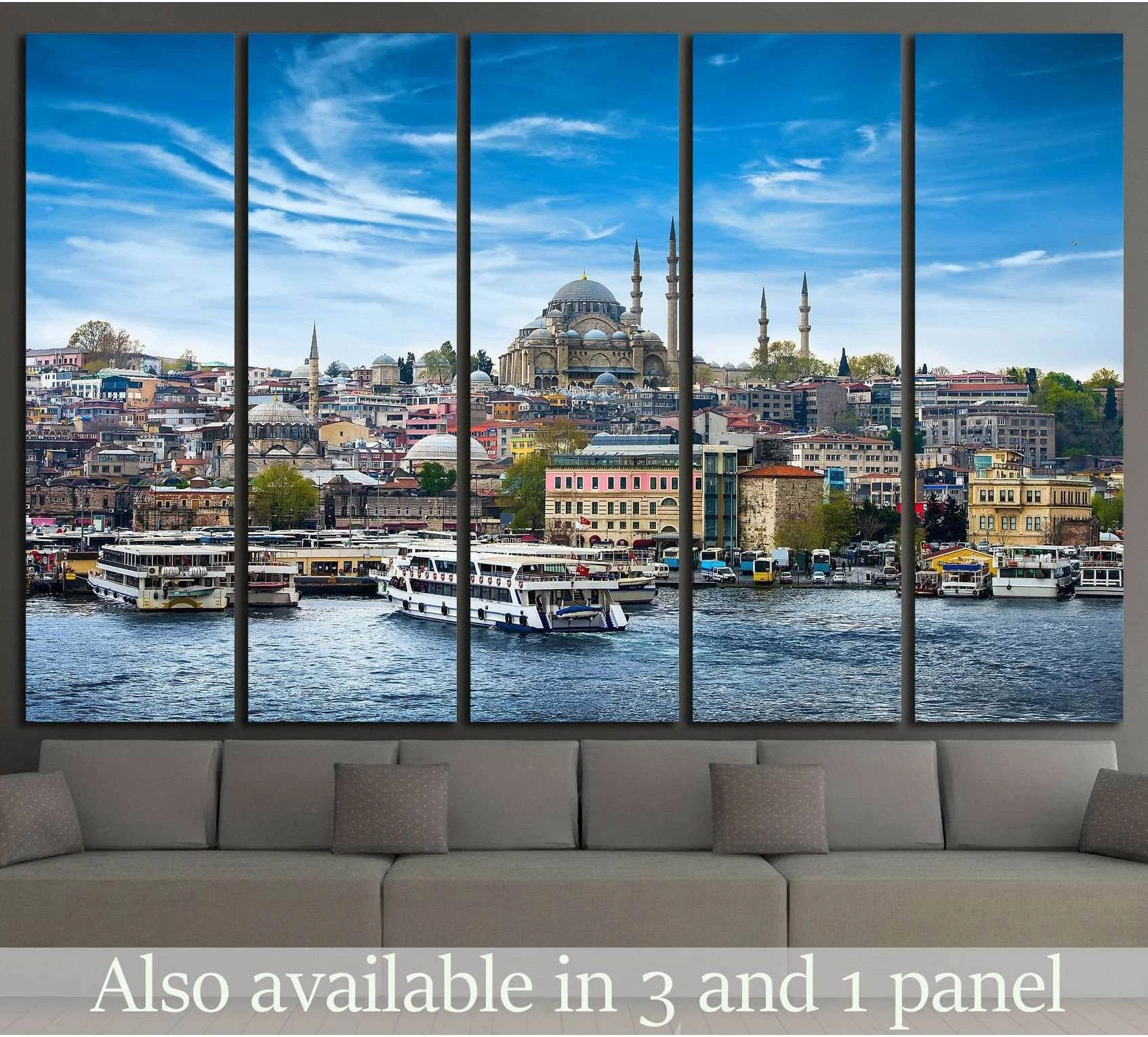 Istanbul skyline canvas print with Suleymaniye Mosque and boats on the Bosphorus above a sofa