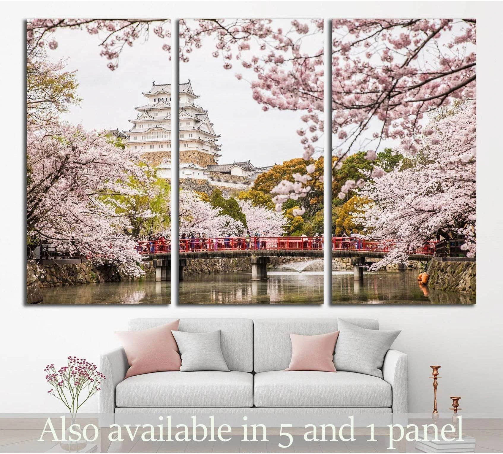 Himeji Castle canvas print with pink cherry blossoms and red bridge above a sofa